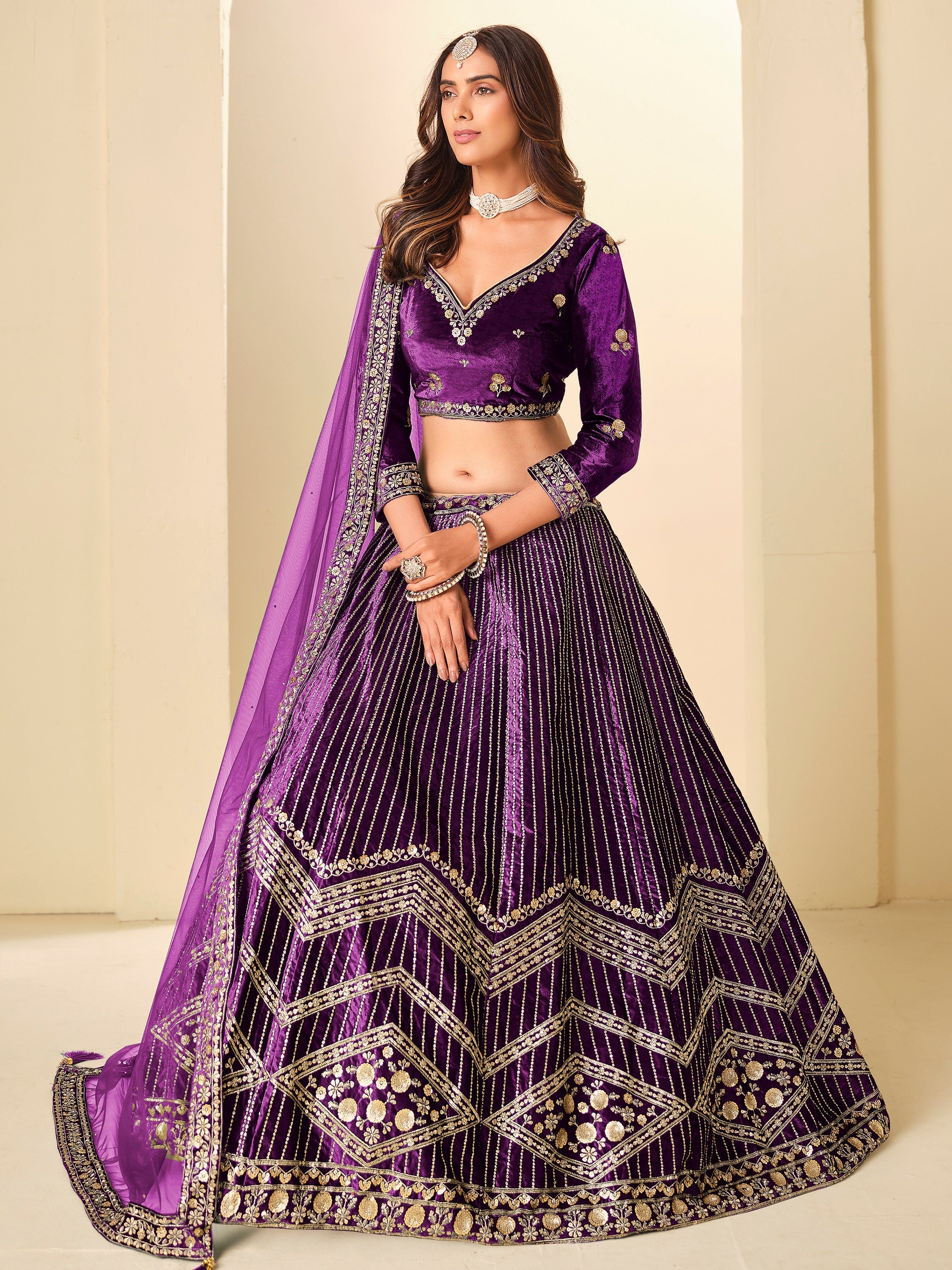 Rich Purple Heavy Embroidered Velvet Engagement Wear Lehenga With Blouse