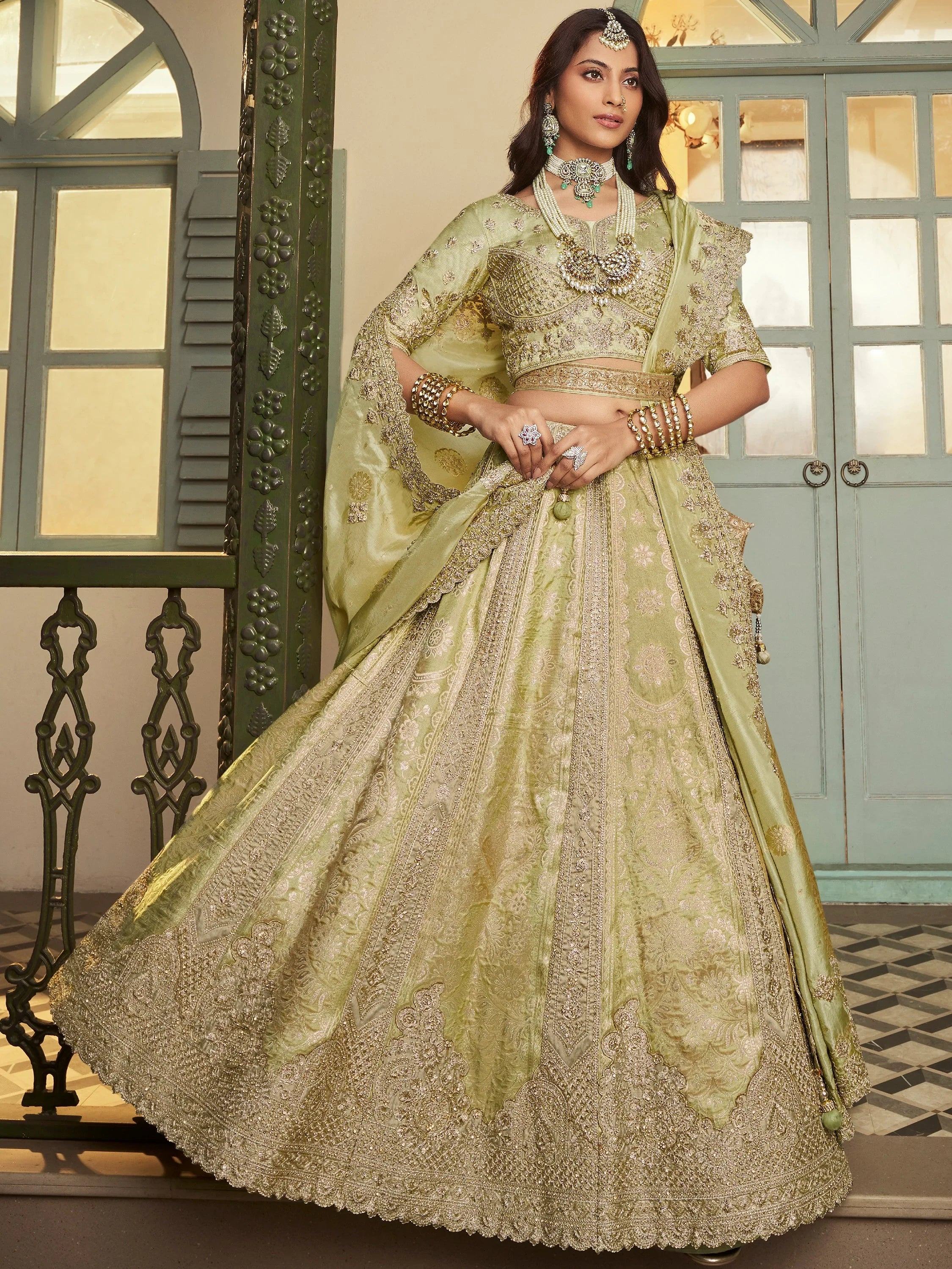 Magnificent Green Embroidered Silk Engagement Wear Lehenga Choli