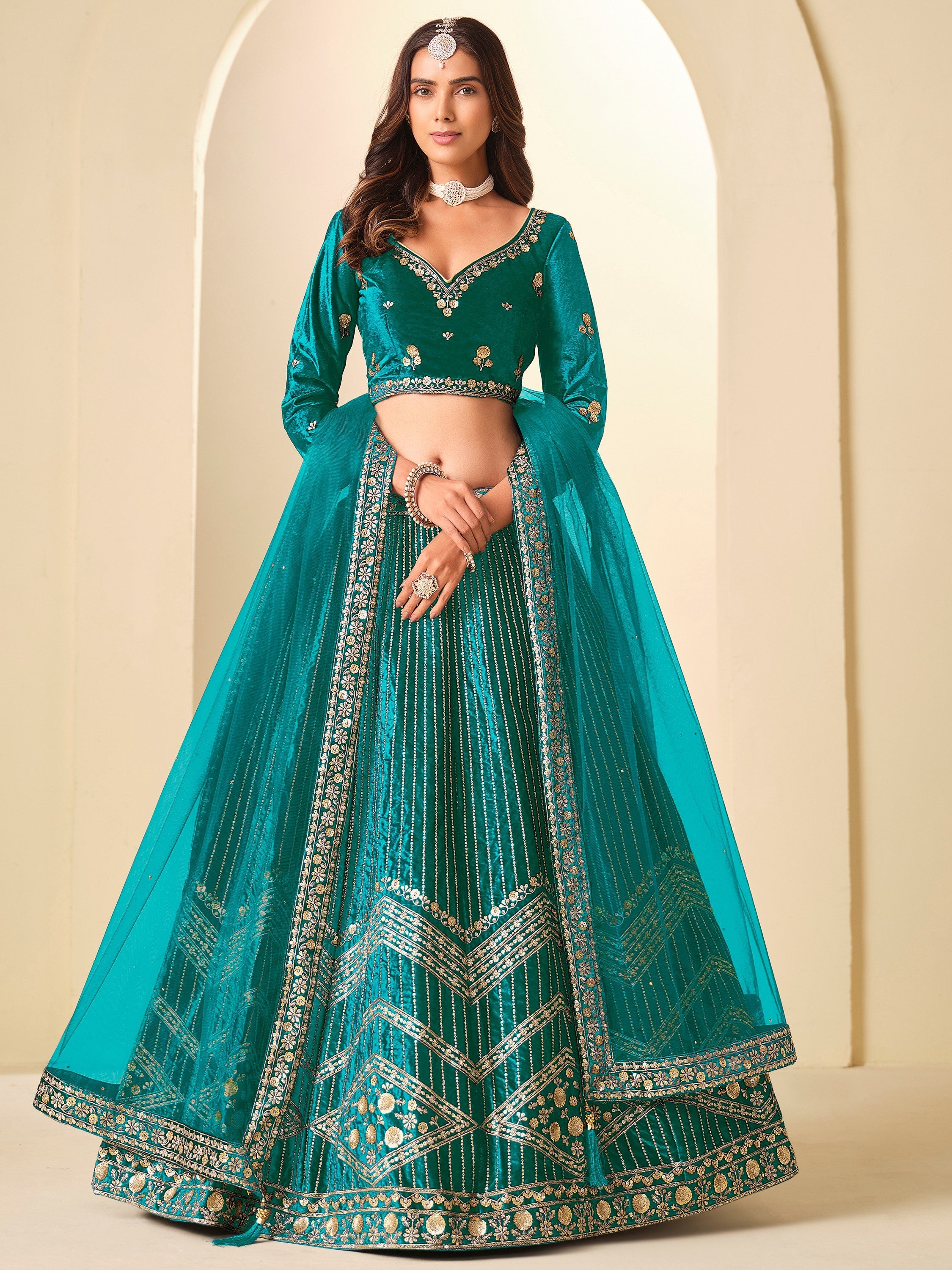 Graceful Teal Blue Embroidered Velvet Reception Wear Lehenga Choli