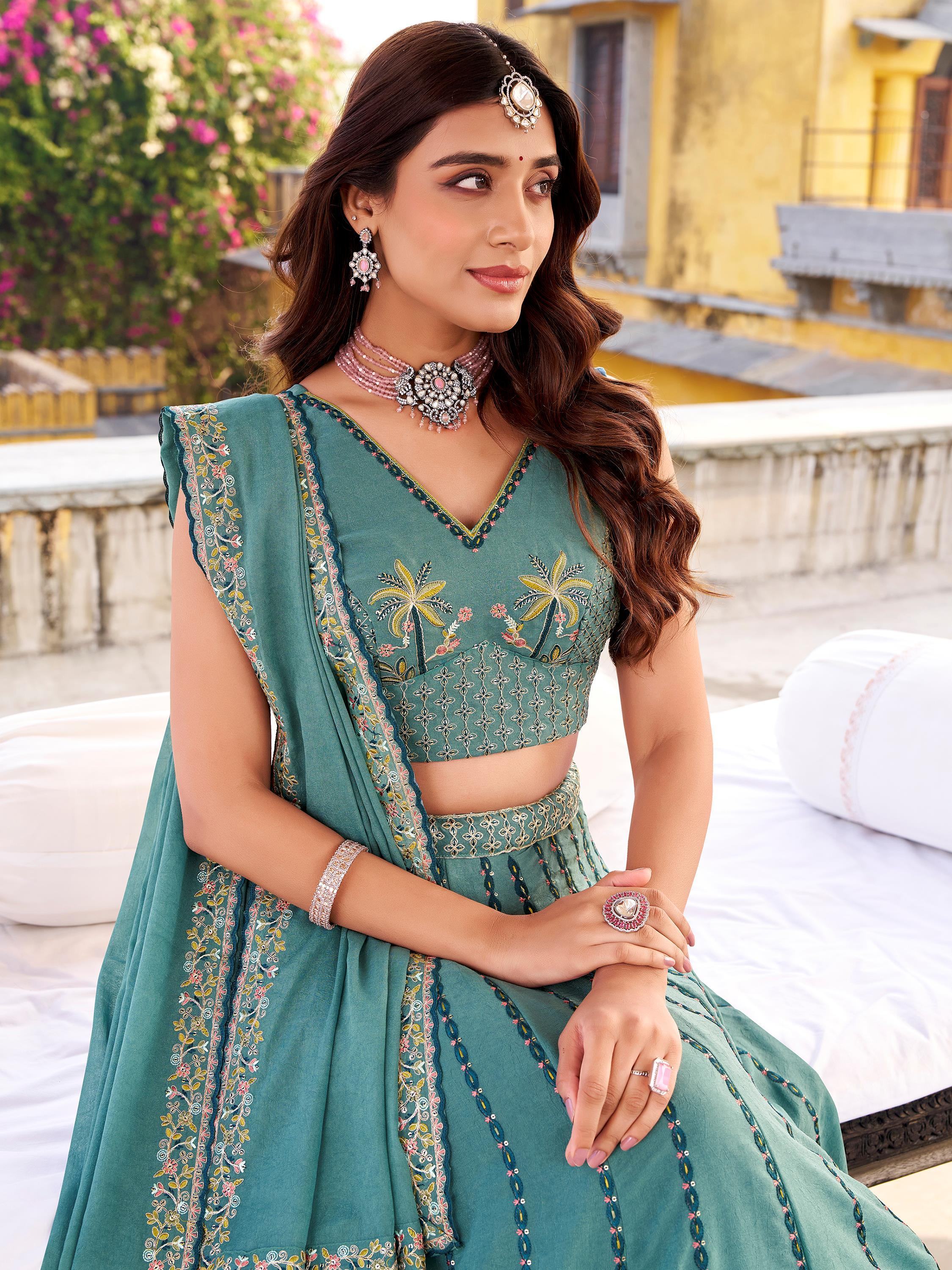 Sky Blue Glowing Thread Embroidered Silk Festival Wear Lehenga Choli