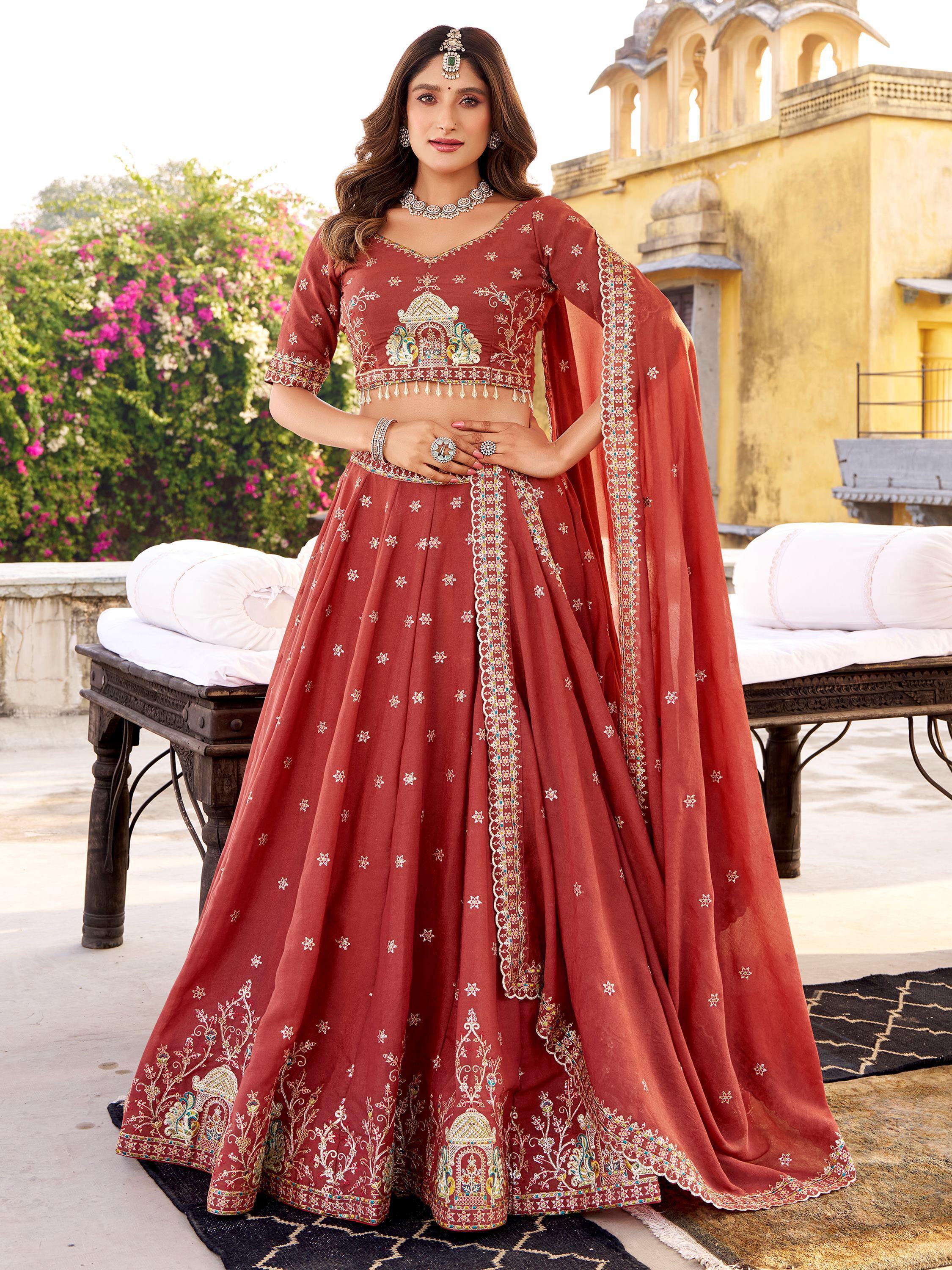 Orange Glowing Thread Embroidered Silk Festival Wear Lehenga Choli