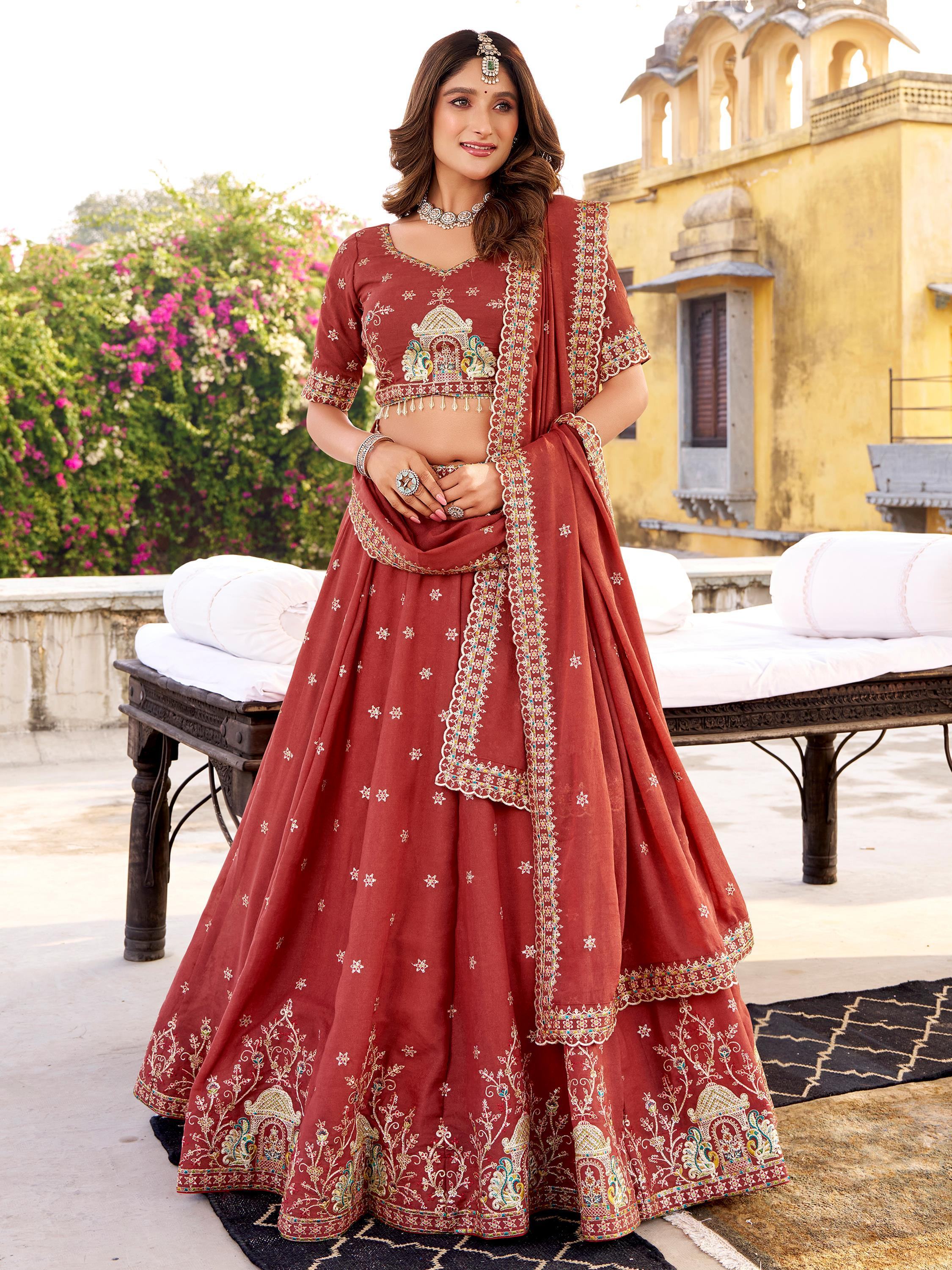 Orange Glowing Thread Embroidered Silk Festival Wear Lehenga Choli