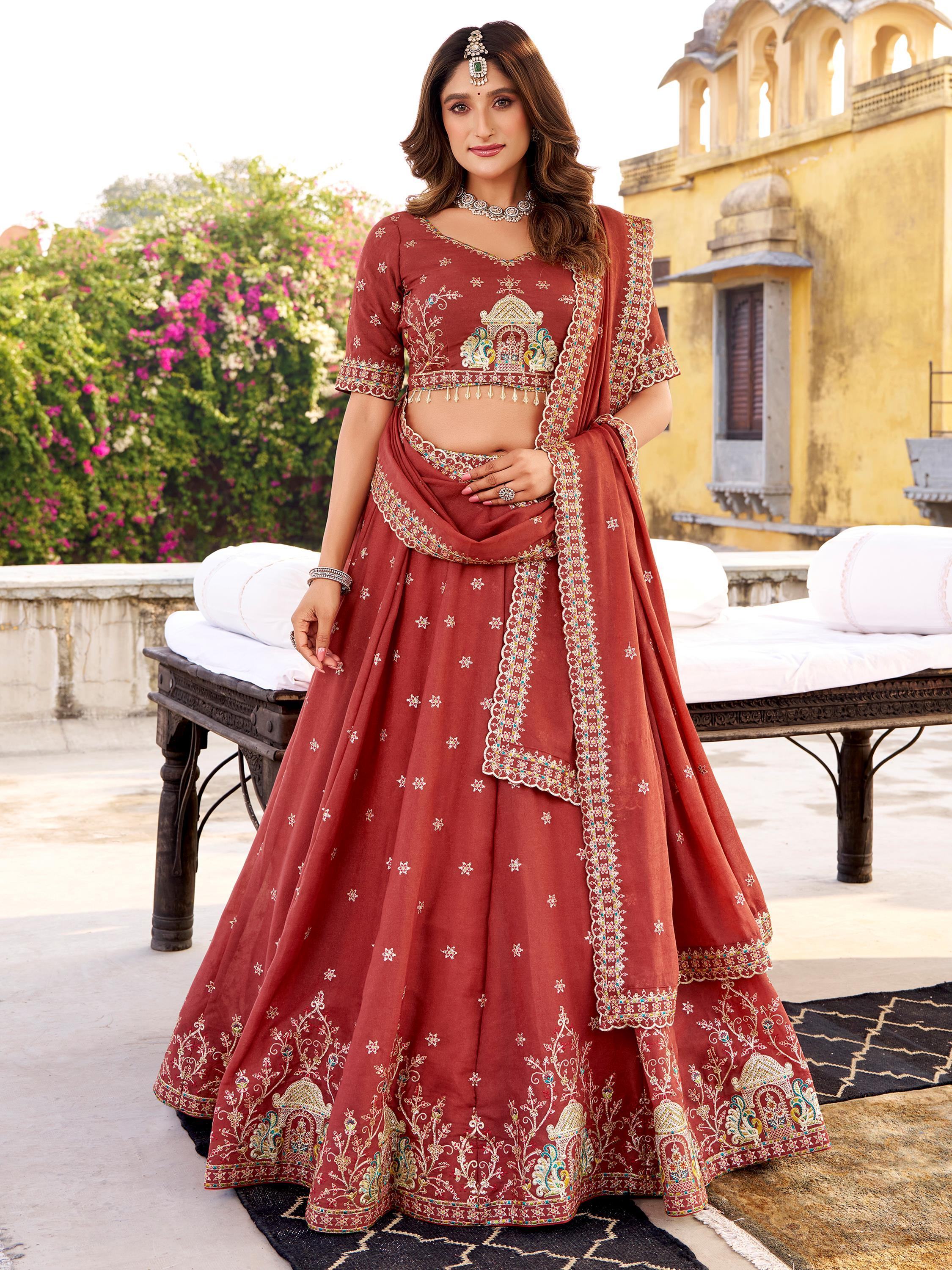 Orange Glowing Thread Embroidered Silk Festival Wear Lehenga Choli