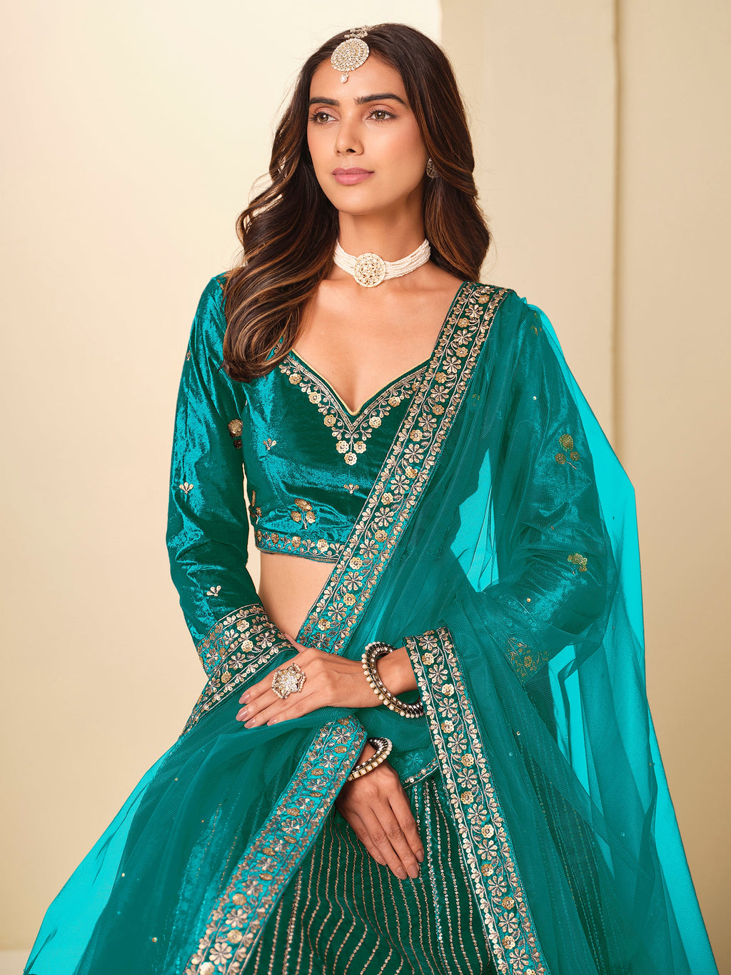 Graceful Teal Blue Embroidered Velvet Reception Wear Lehenga Choli