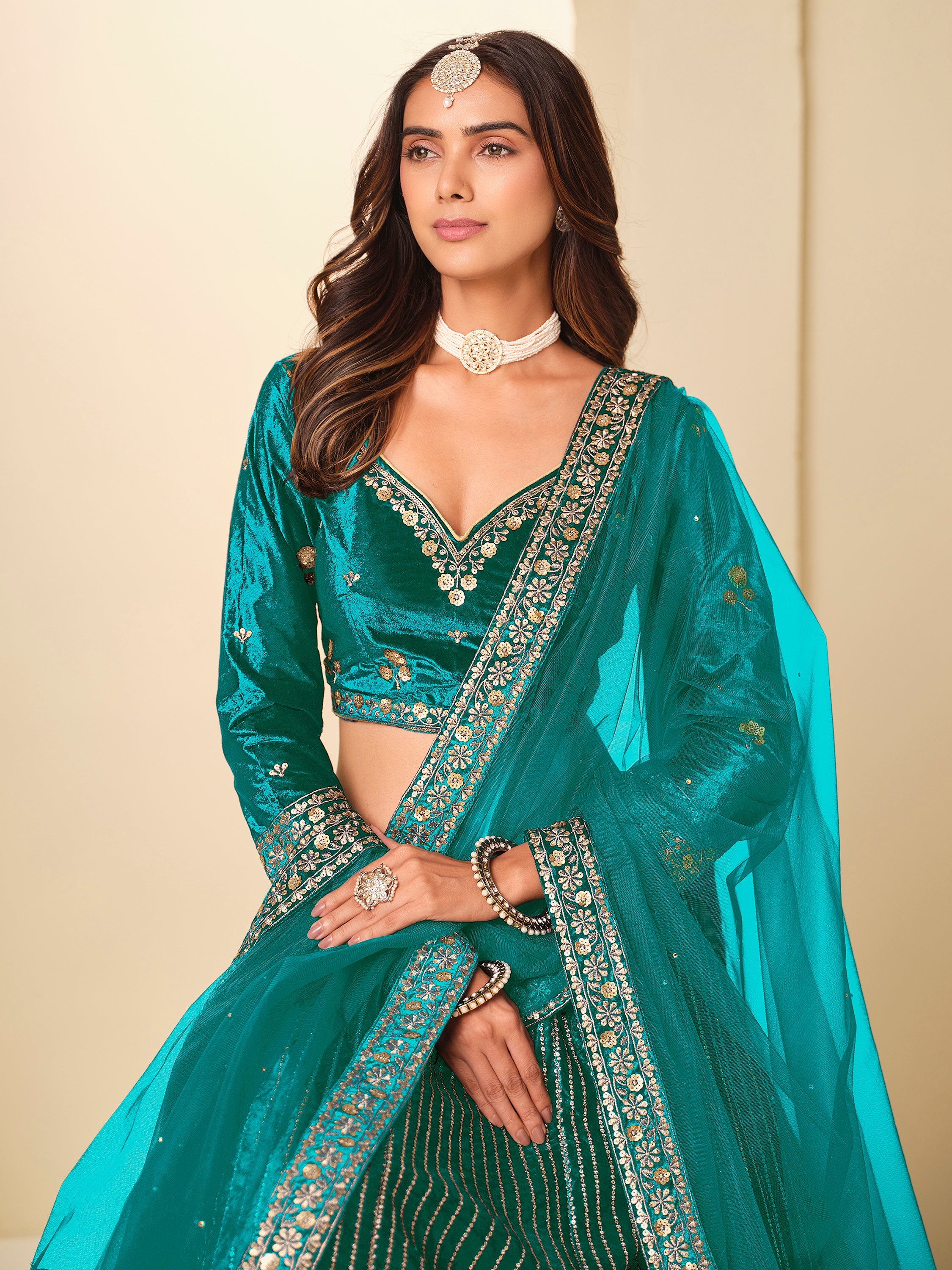 Graceful Teal Blue Embroidered Velvet Reception Wear Lehenga Choli