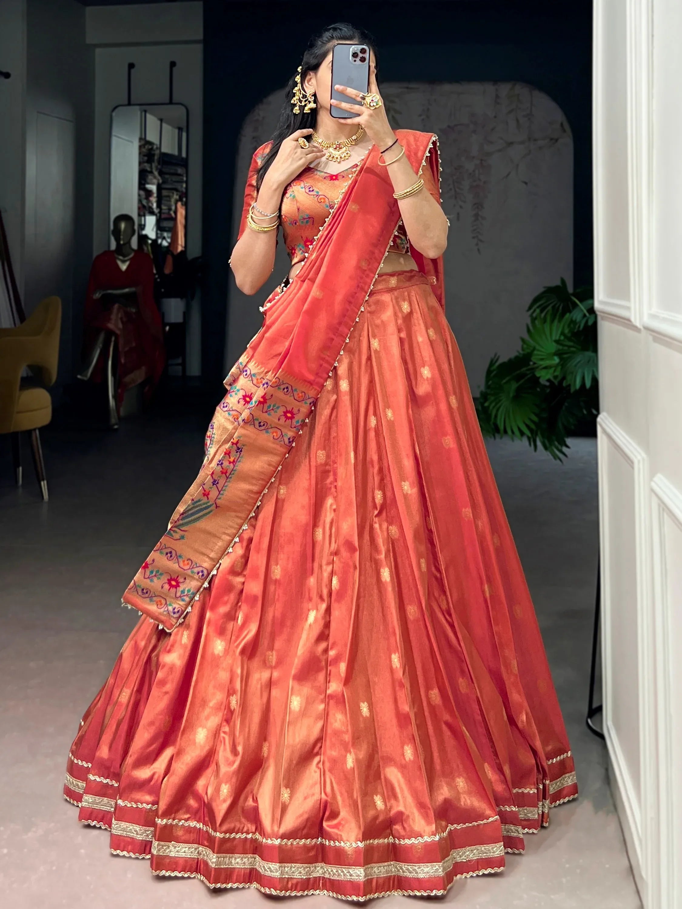 Orange Fantastic Zari Weaving Shimmer Wedding Wear Lehenga Choli