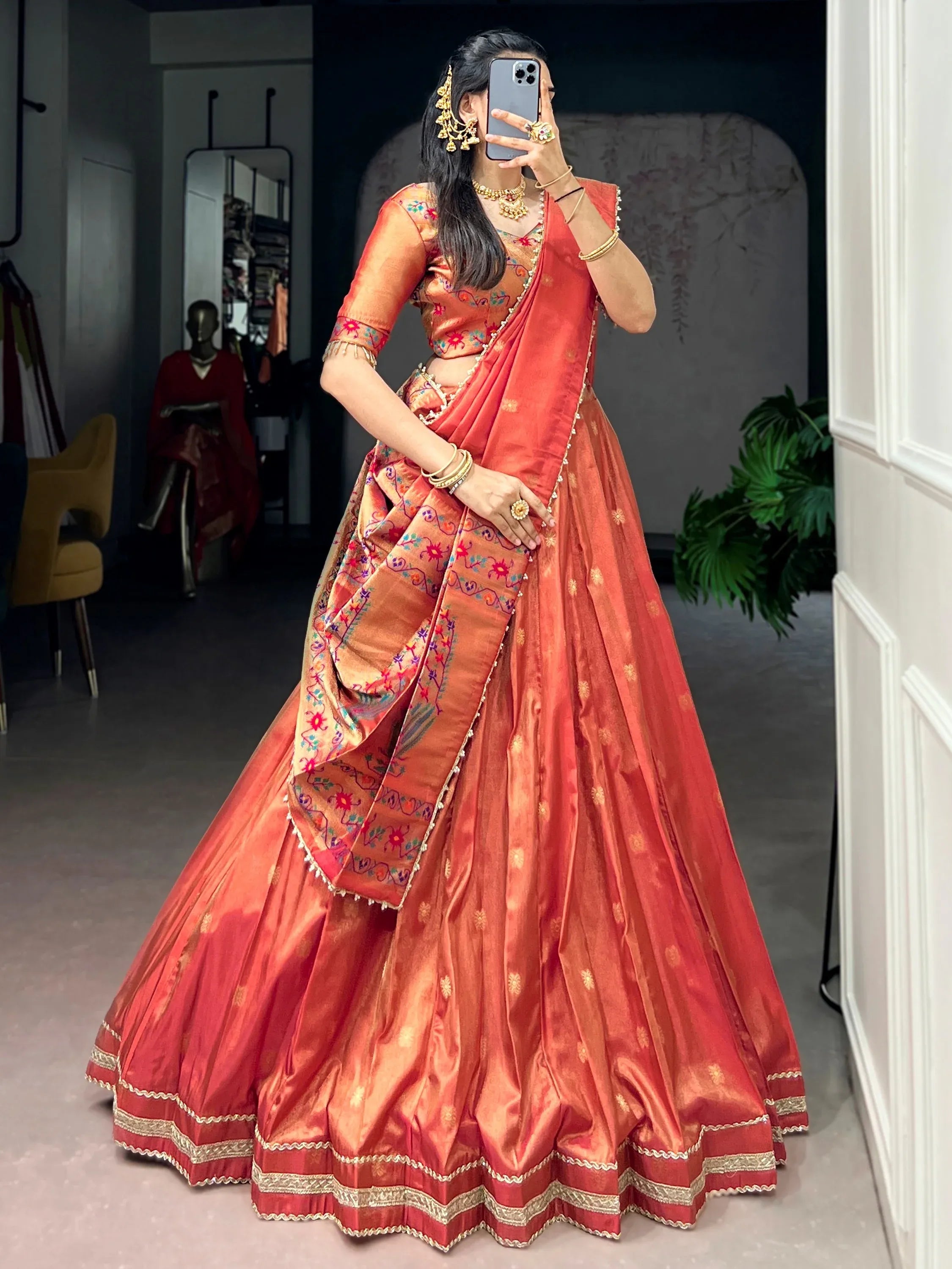 Orange Fantastic Zari Weaving Shimmer Wedding Wear Lehenga Choli