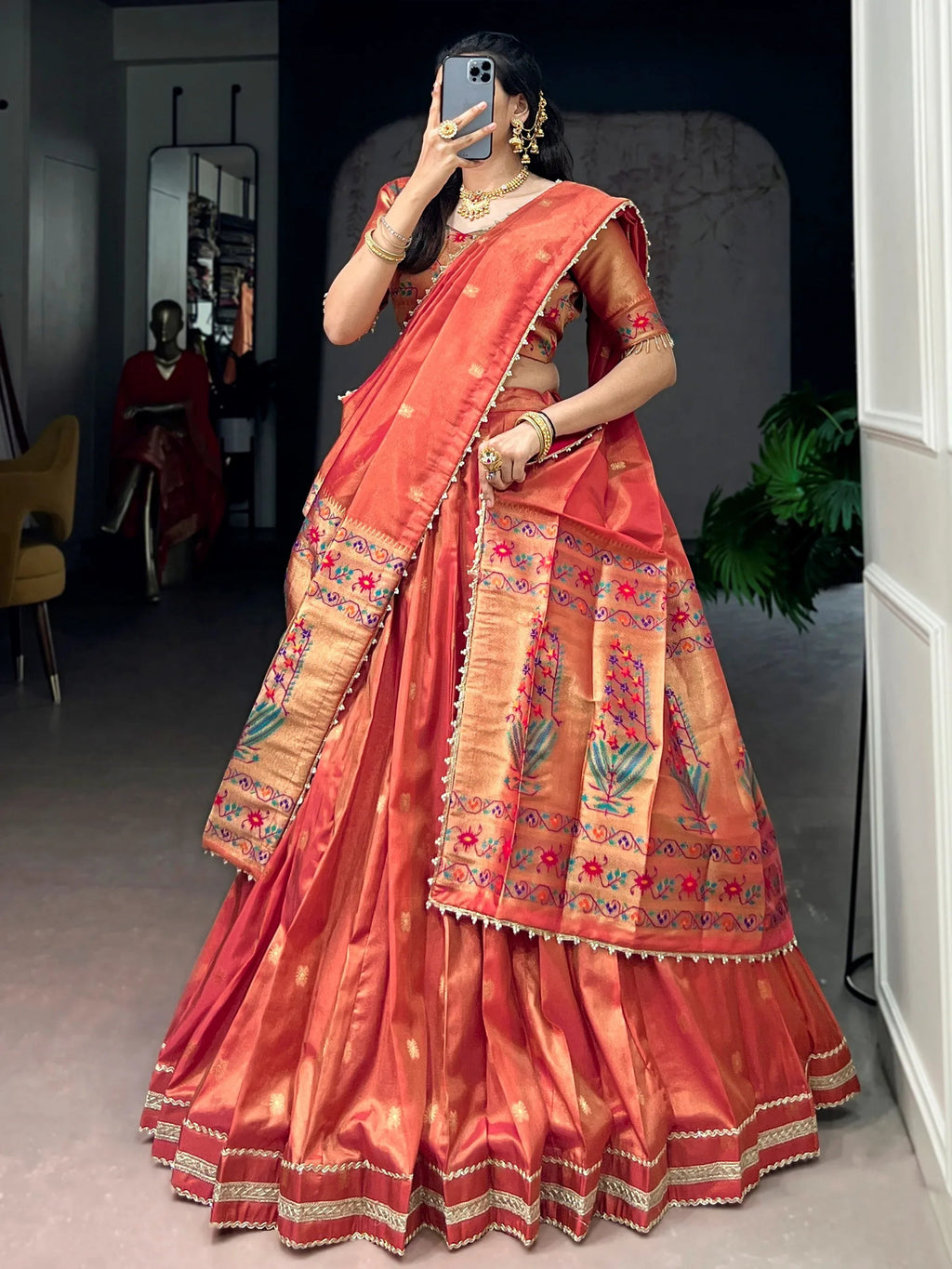 Orange Fantastic Zari Weaving Shimmer Wedding Wear Lehenga Choli