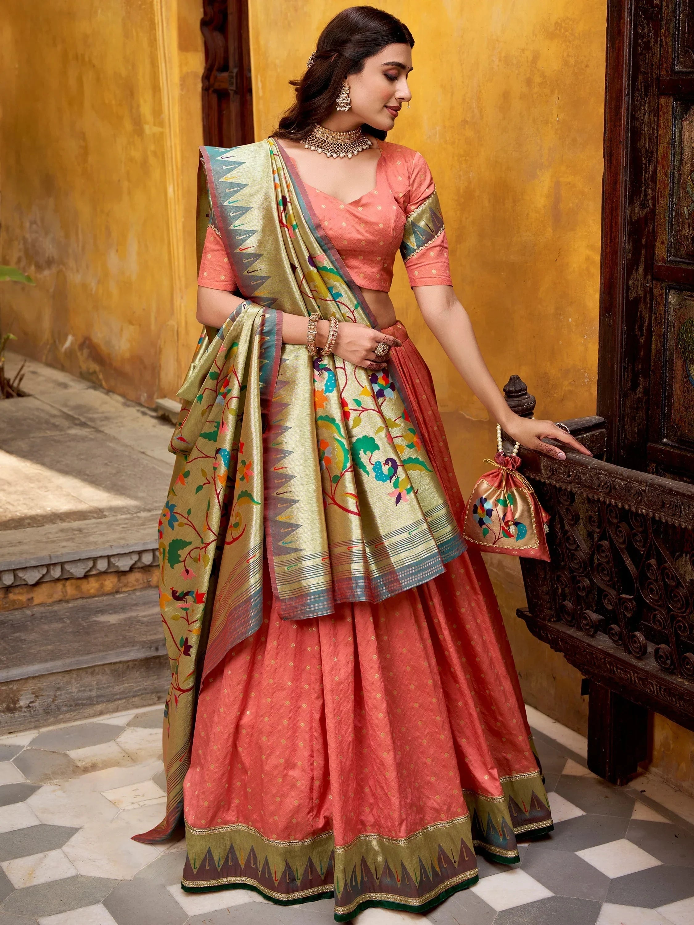 Peach Beautiful Zari Weaving Silk Festival Wear Lehenga Choli