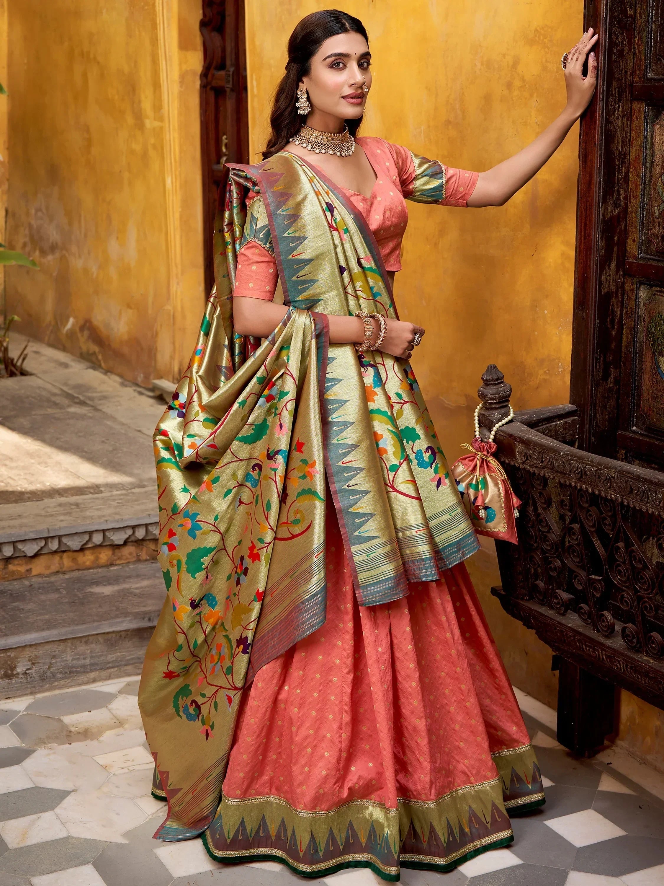 Peach Beautiful Zari Weaving Silk Festival Wear Lehenga Choli