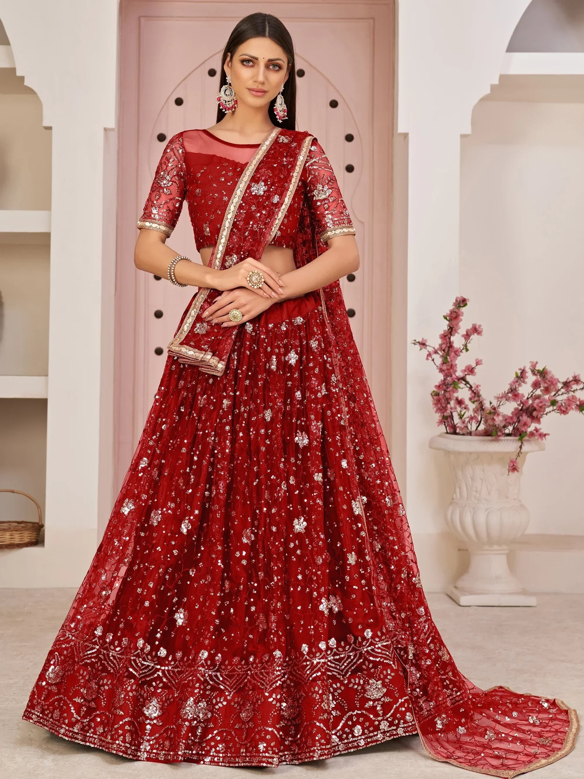 Red Awesome Bottle Sequins Embroidered Net Lehenga Choli