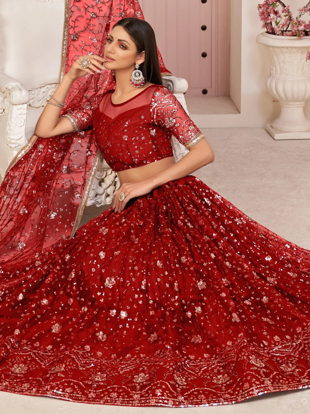 Red Awesome Bottle Sequins Embroidered Net Lehenga Choli