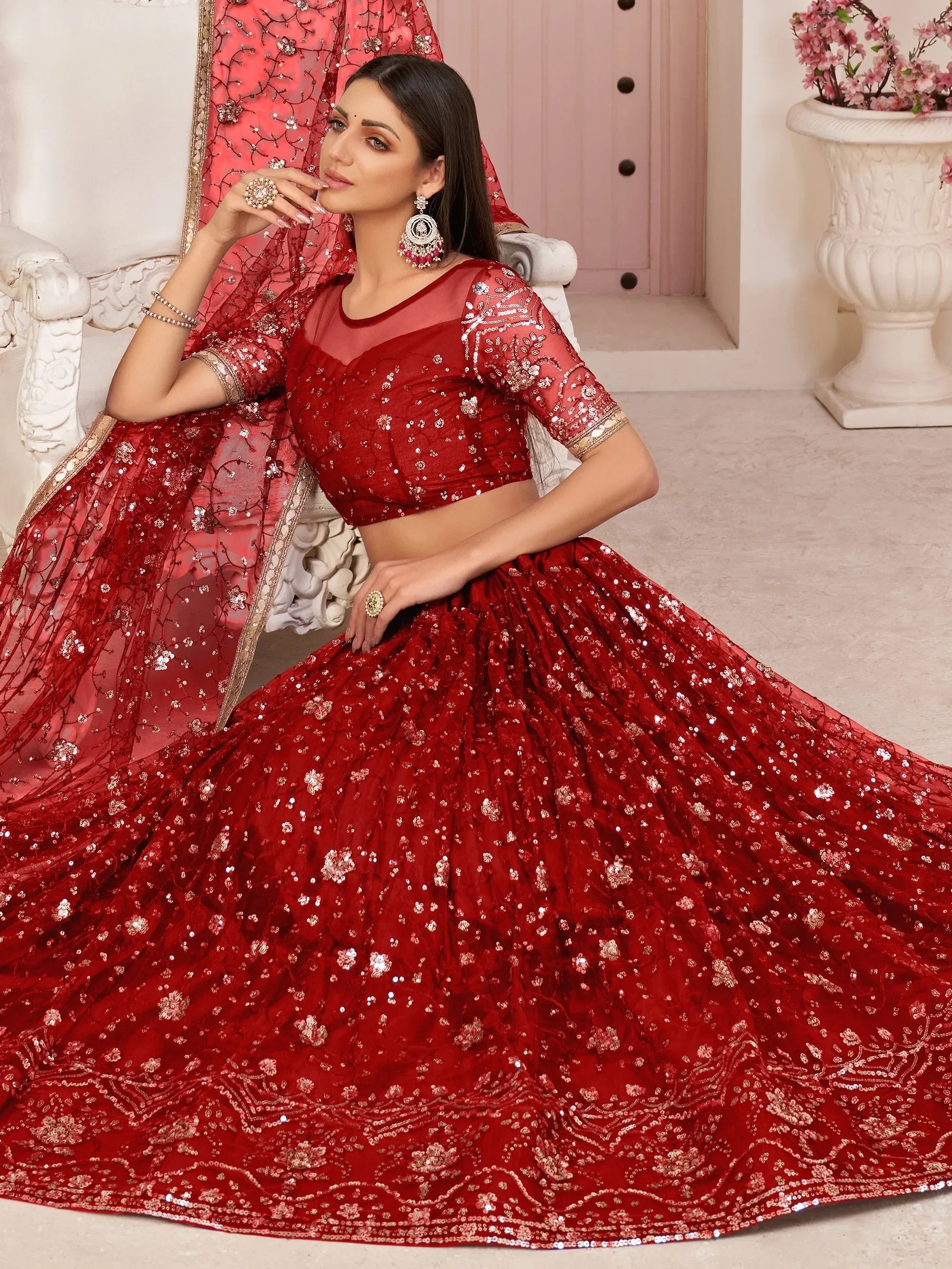 Red Awesome Bottle Sequins Embroidered Net Lehenga Choli