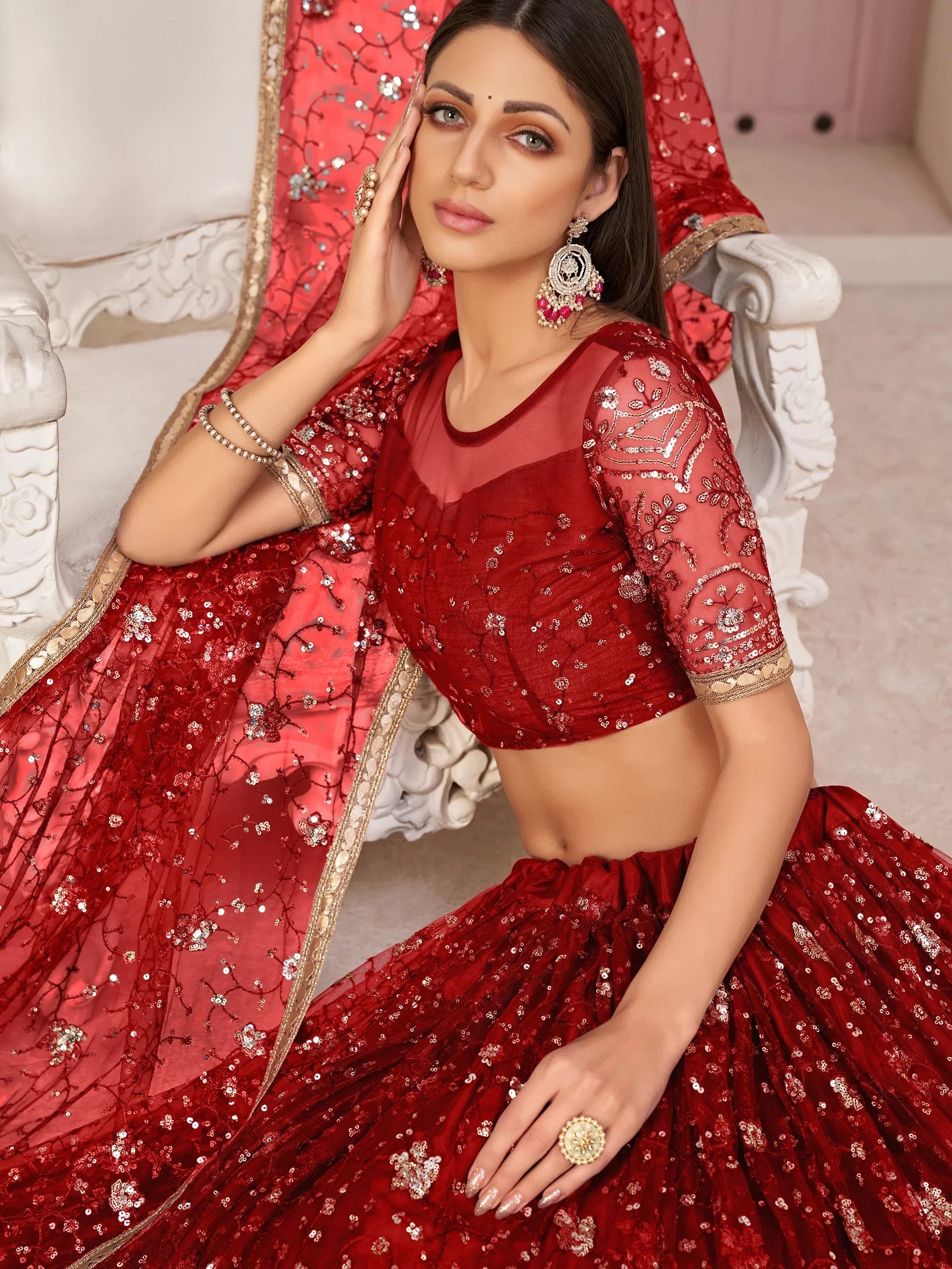 Red Awesome Bottle Sequins Embroidered Net Lehenga Choli