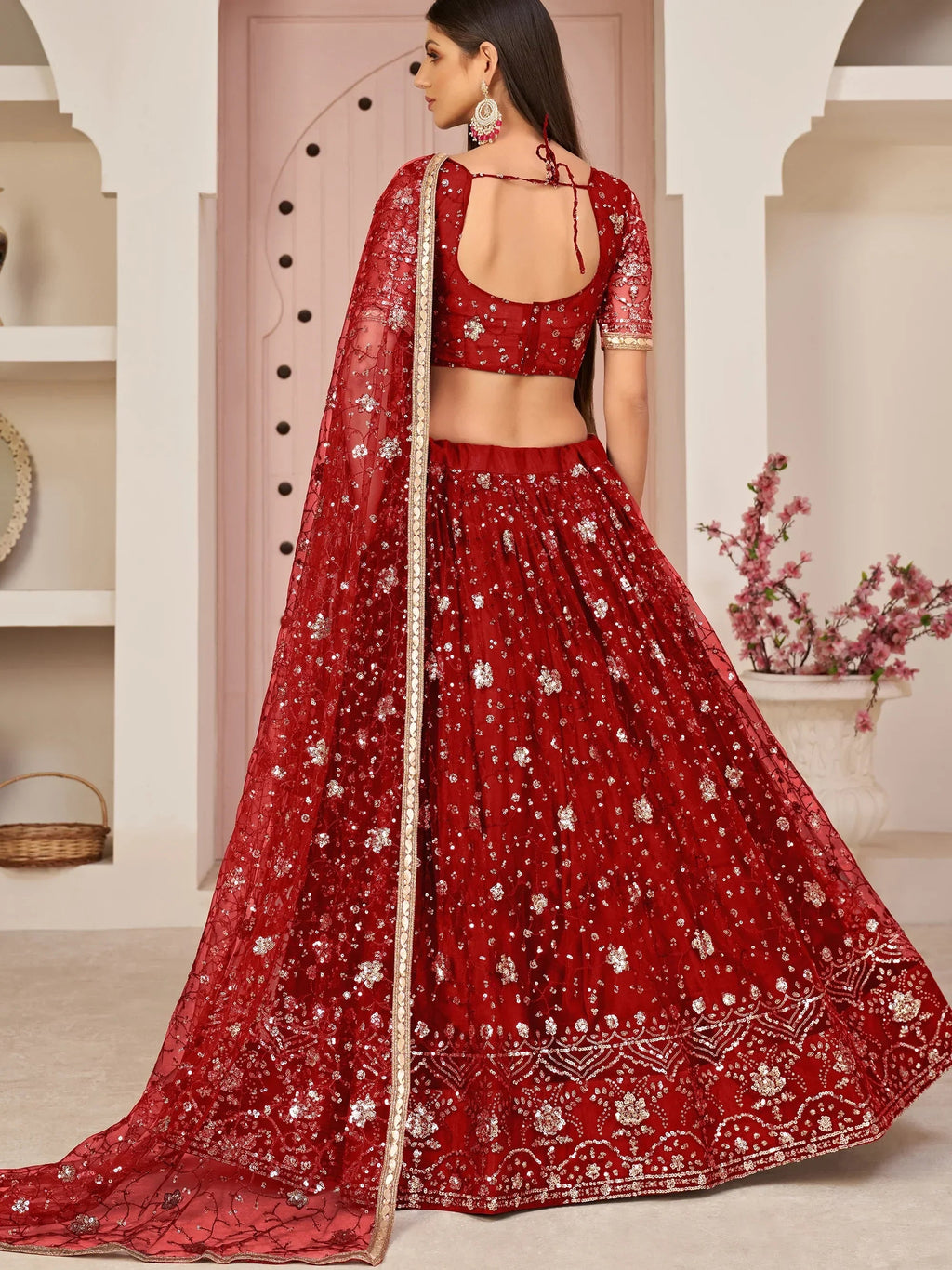 Red Awesome Bottle Sequins Embroidered Net Lehenga Choli