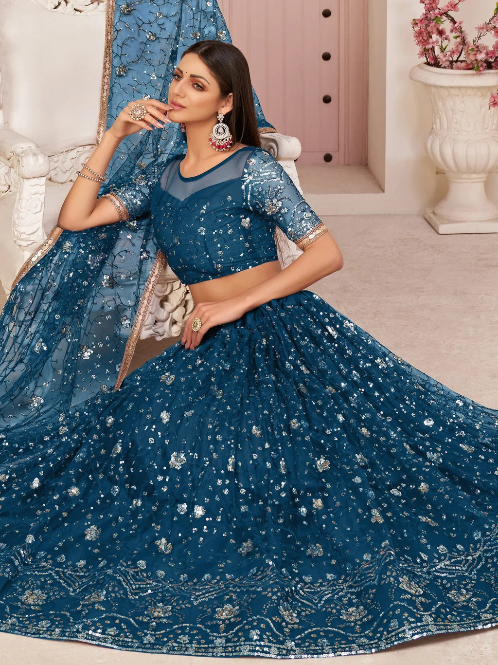 Blue Awesome Bottle Sequins Embroidered Net Lehenga Choli