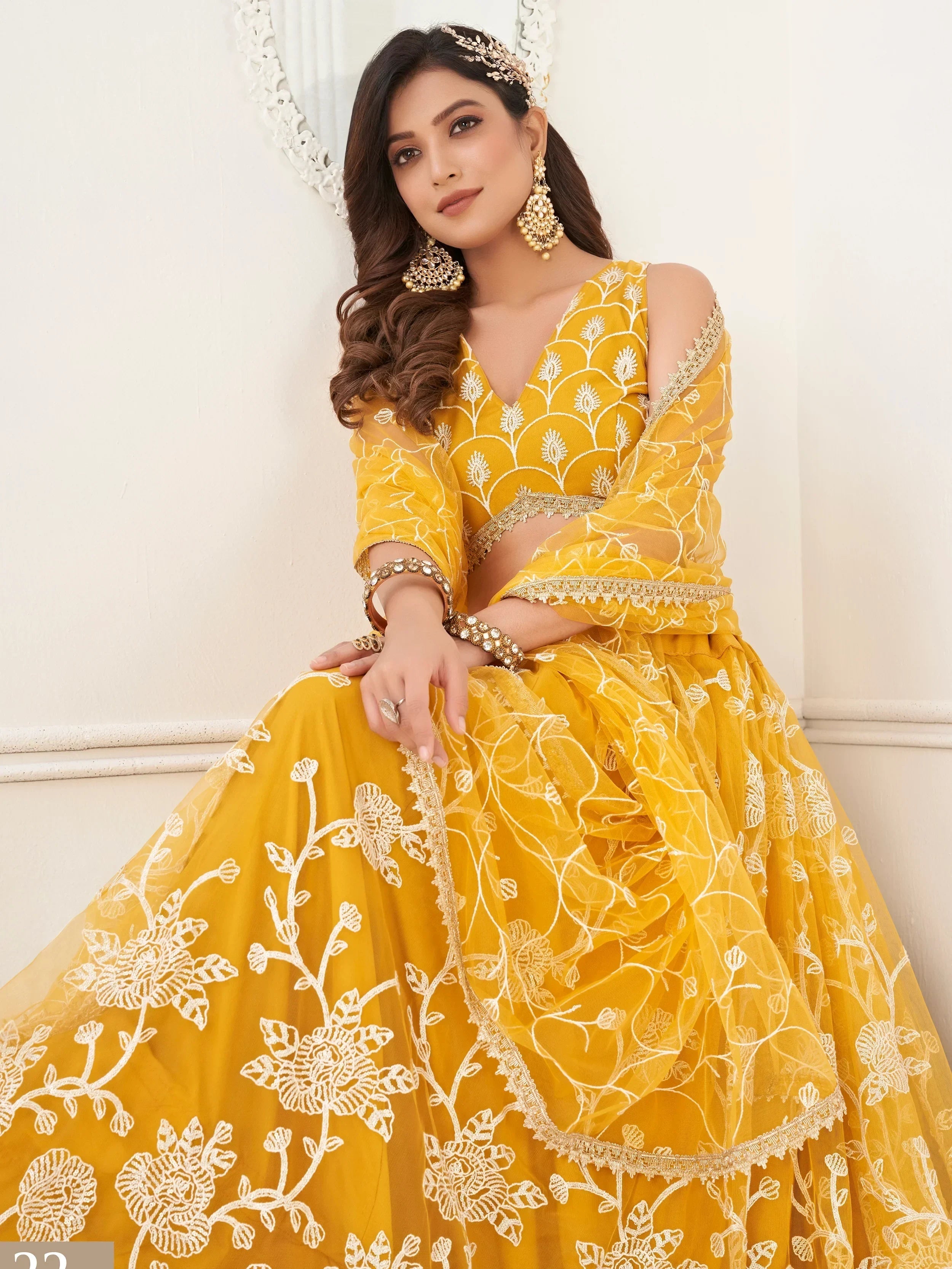 Mustard Appealing Embroidered Net Haldi Wear Lehenga Choli
