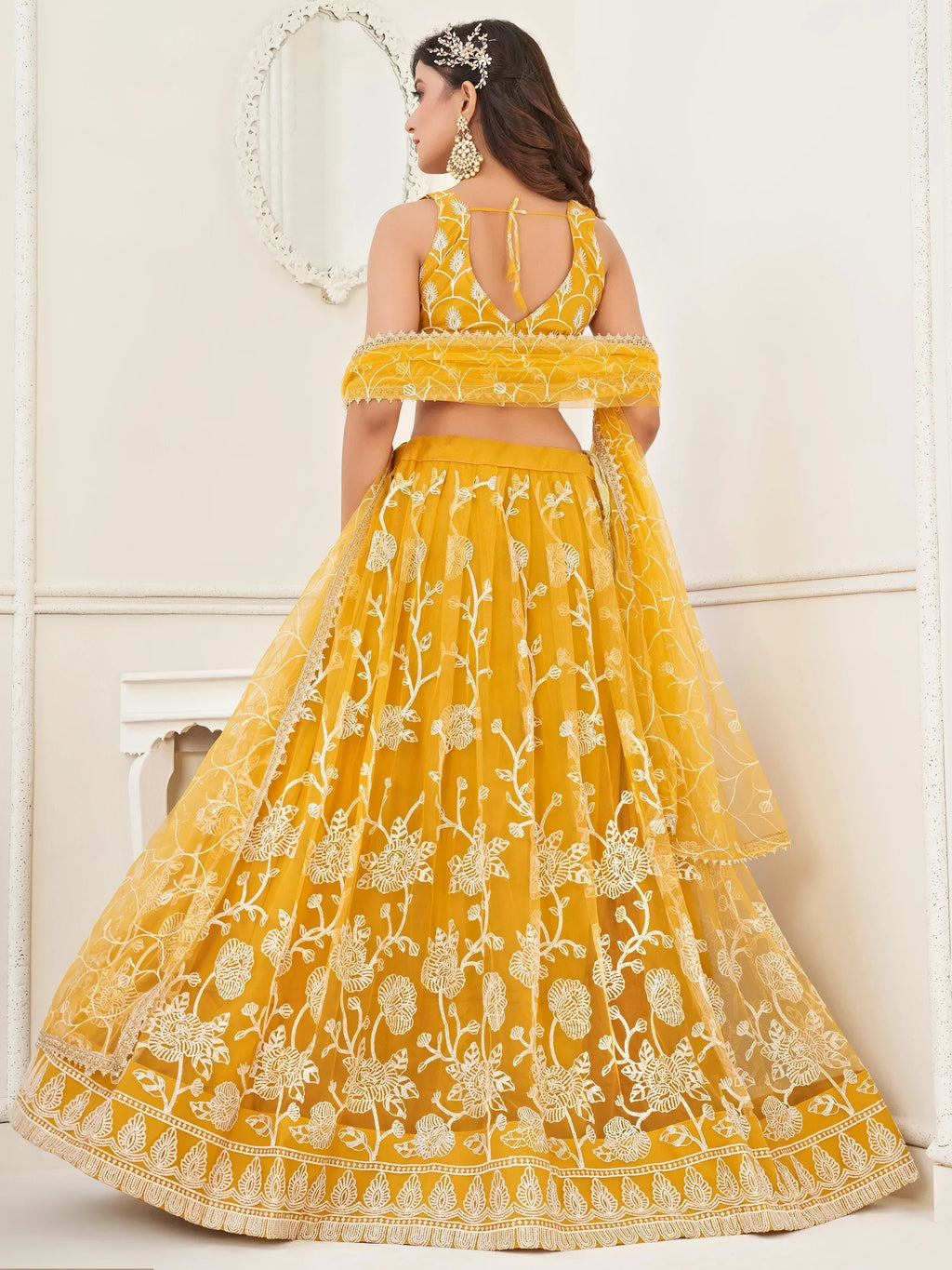 Mustard Appealing Embroidered Net Haldi Wear Lehenga Choli