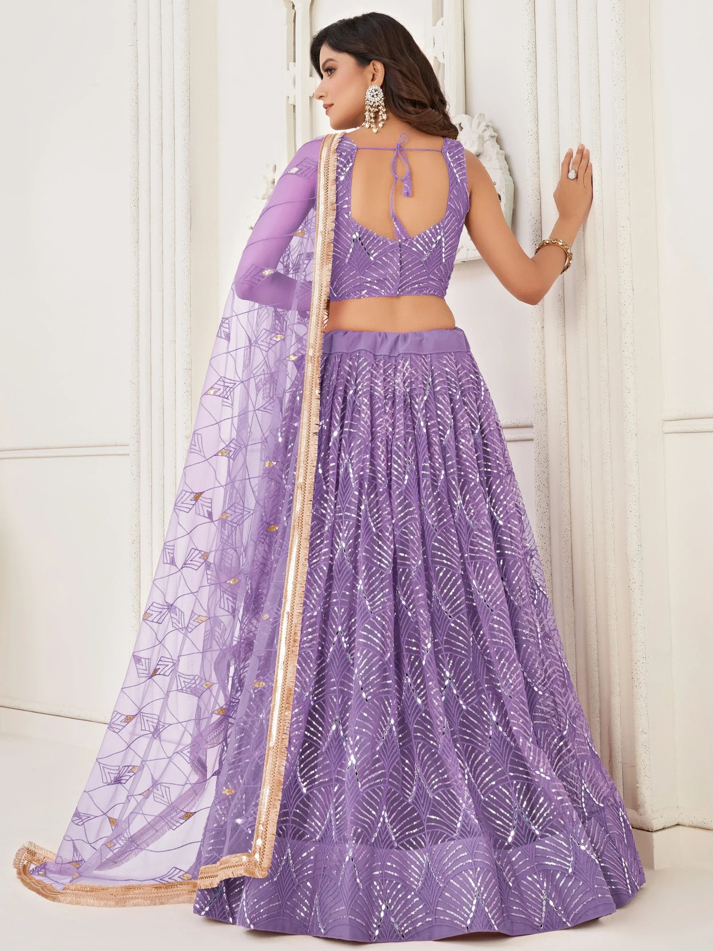 Lavender Beautiful Sequins Net Reception Wear Lehenga Choli With Dupatta