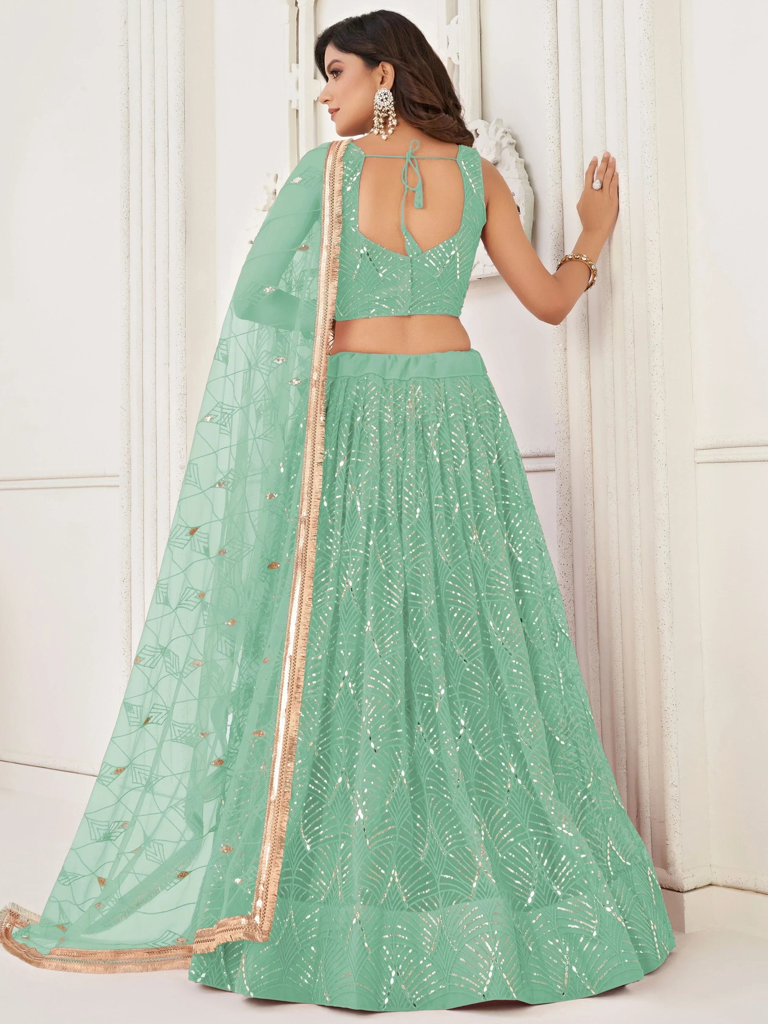 Sparkling Green Embroidered Net Function Wear Lehenga Choli