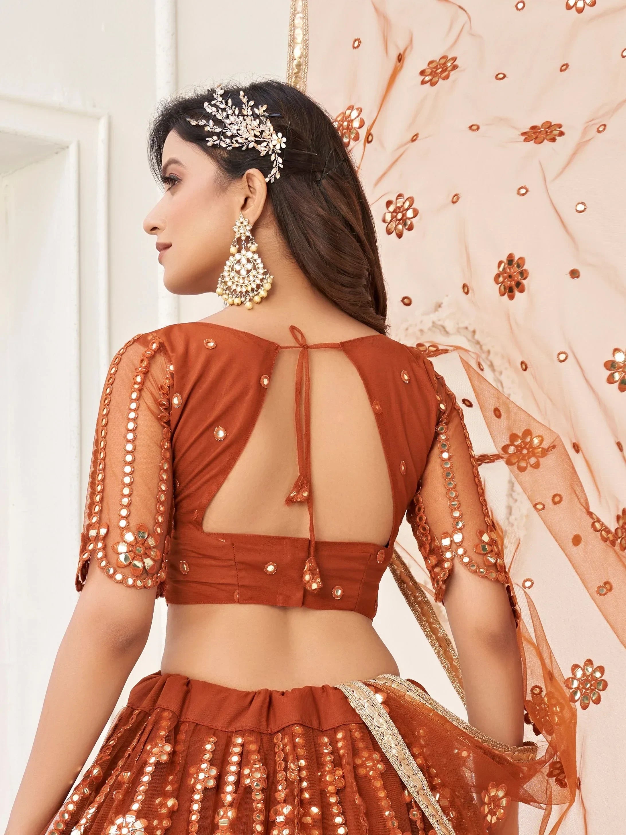 Amazing Brown Mirror Work Net Party Wear Lehenga Choli With Dupatta