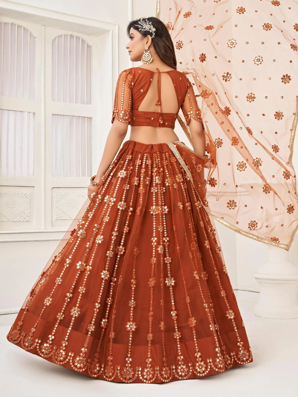 Amazing Brown Mirror Work Net Party Wear Lehenga Choli With Dupatta