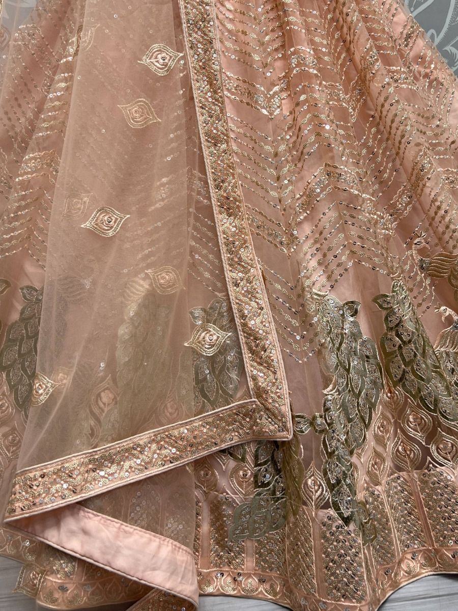 Peach Impressive Sequined Embroidery Wedding Wear Lehenga Choli