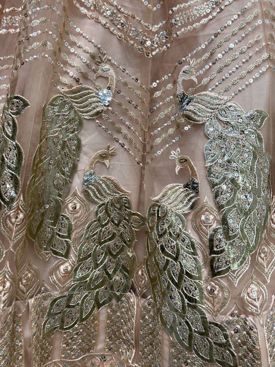 Peach Impressive Sequined Embroidery Wedding Wear Lehenga Choli