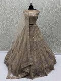Beautiful Golden Net Sequins Bridal Wear Lehenga Choli With Dupatta