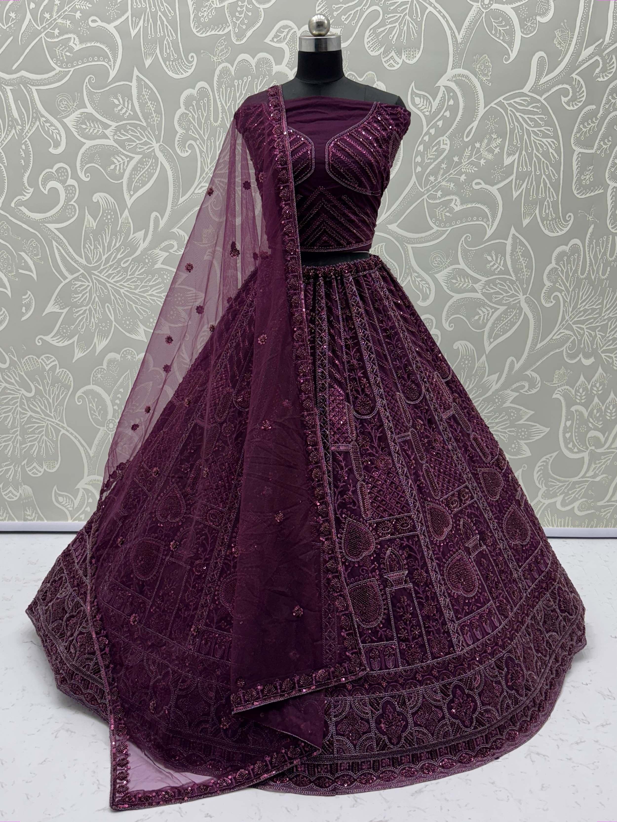 Purple Stunning Net Dori Embroidered Lehenga Choli With Dupatta