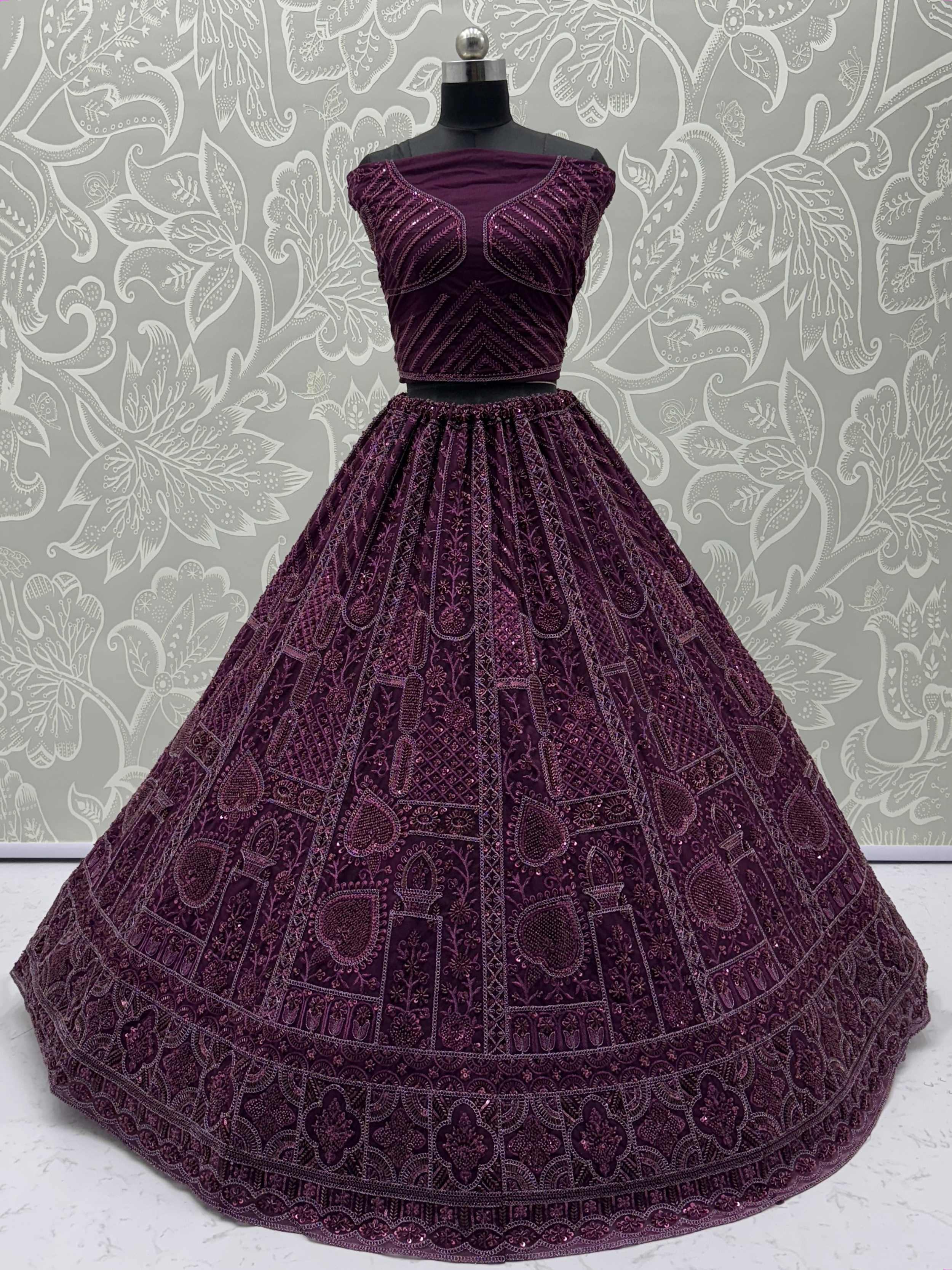 Purple Stunning Net Dori Embroidered Lehenga Choli With Dupatta