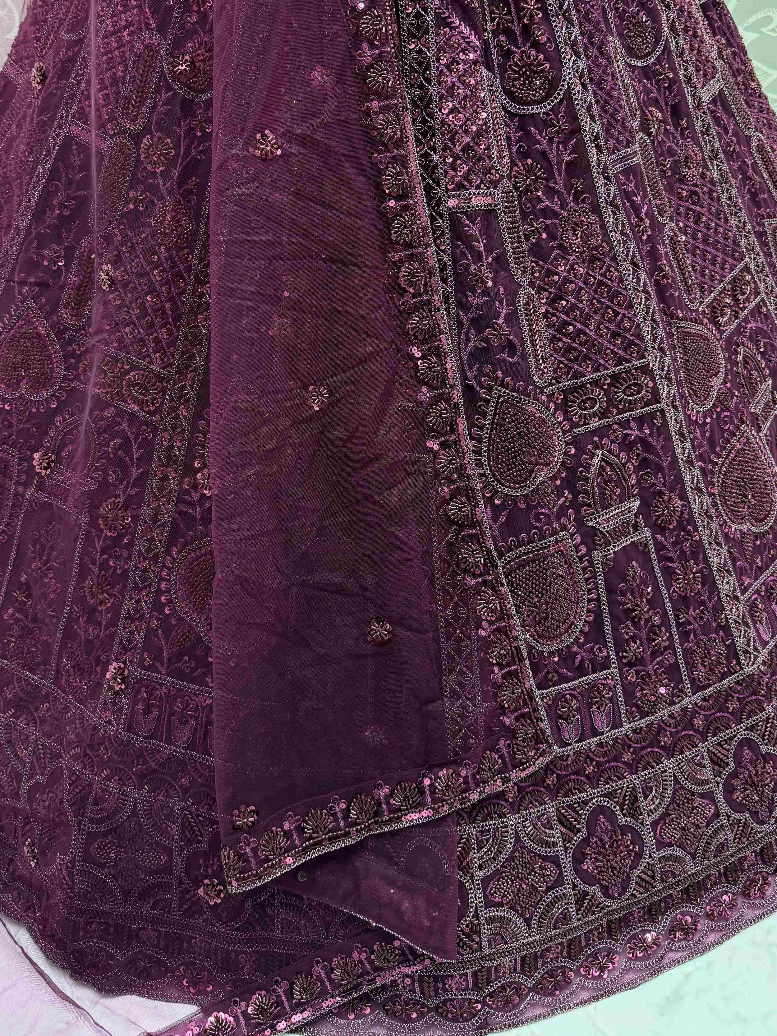 Purple Stunning Net Dori Embroidered Lehenga Choli With Dupatta