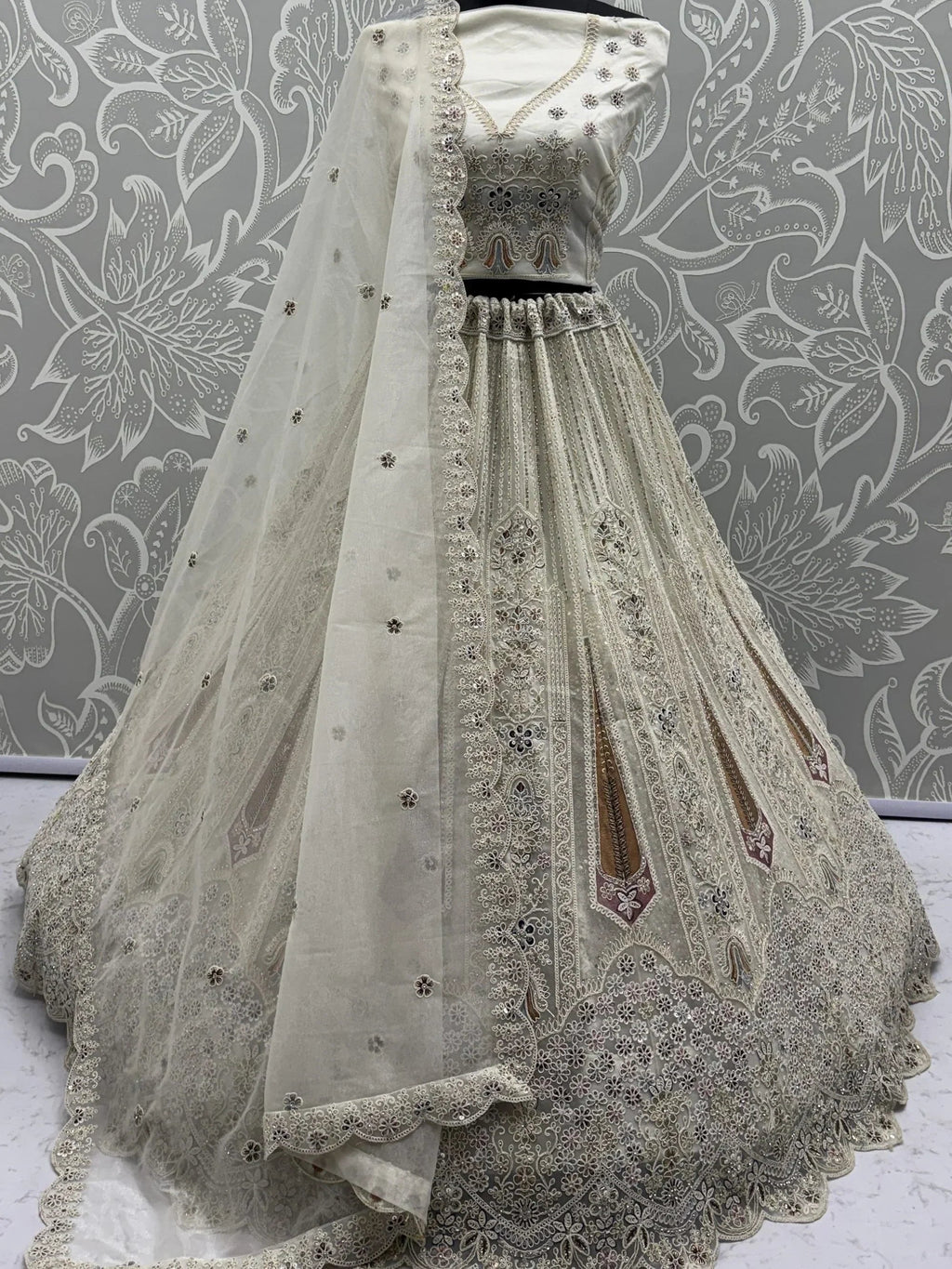 White Stylish Dori Embroidered Net Reception Wear Lehenga Choli
