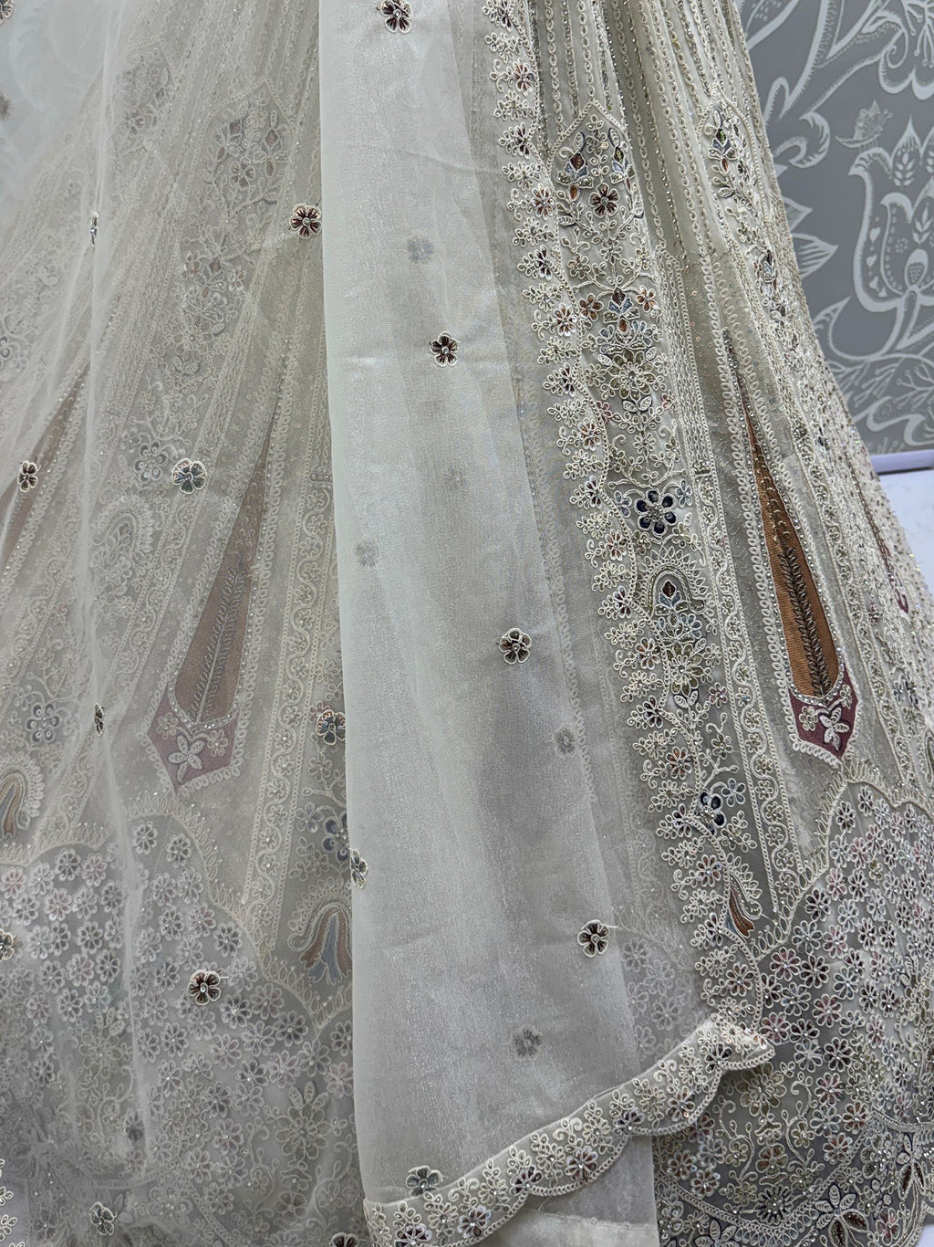 White Stylish Dori Embroidered Net Reception Wear Lehenga Choli