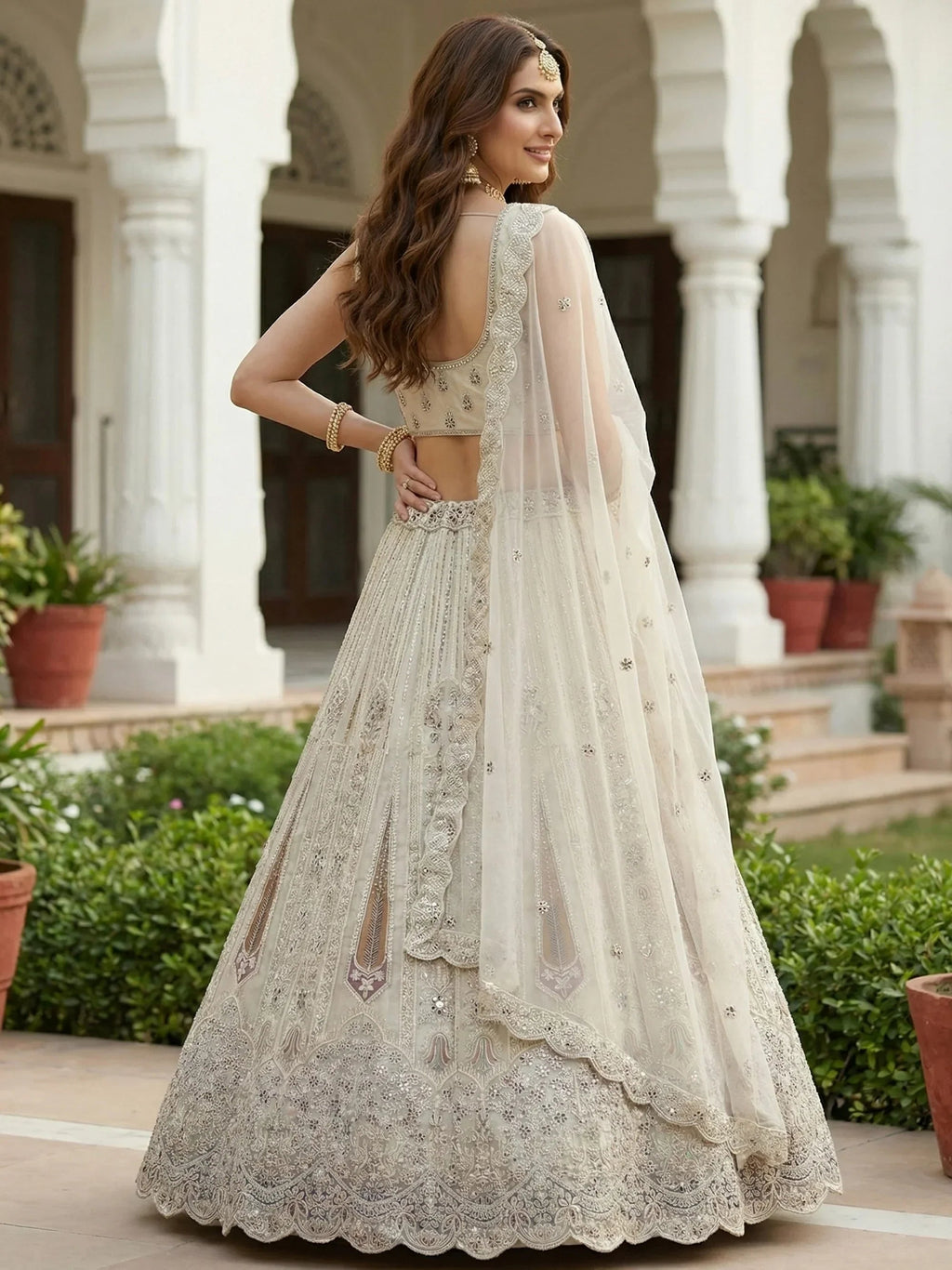 White Stylish Dori Embroidered Net Reception Wear Lehenga Choli
