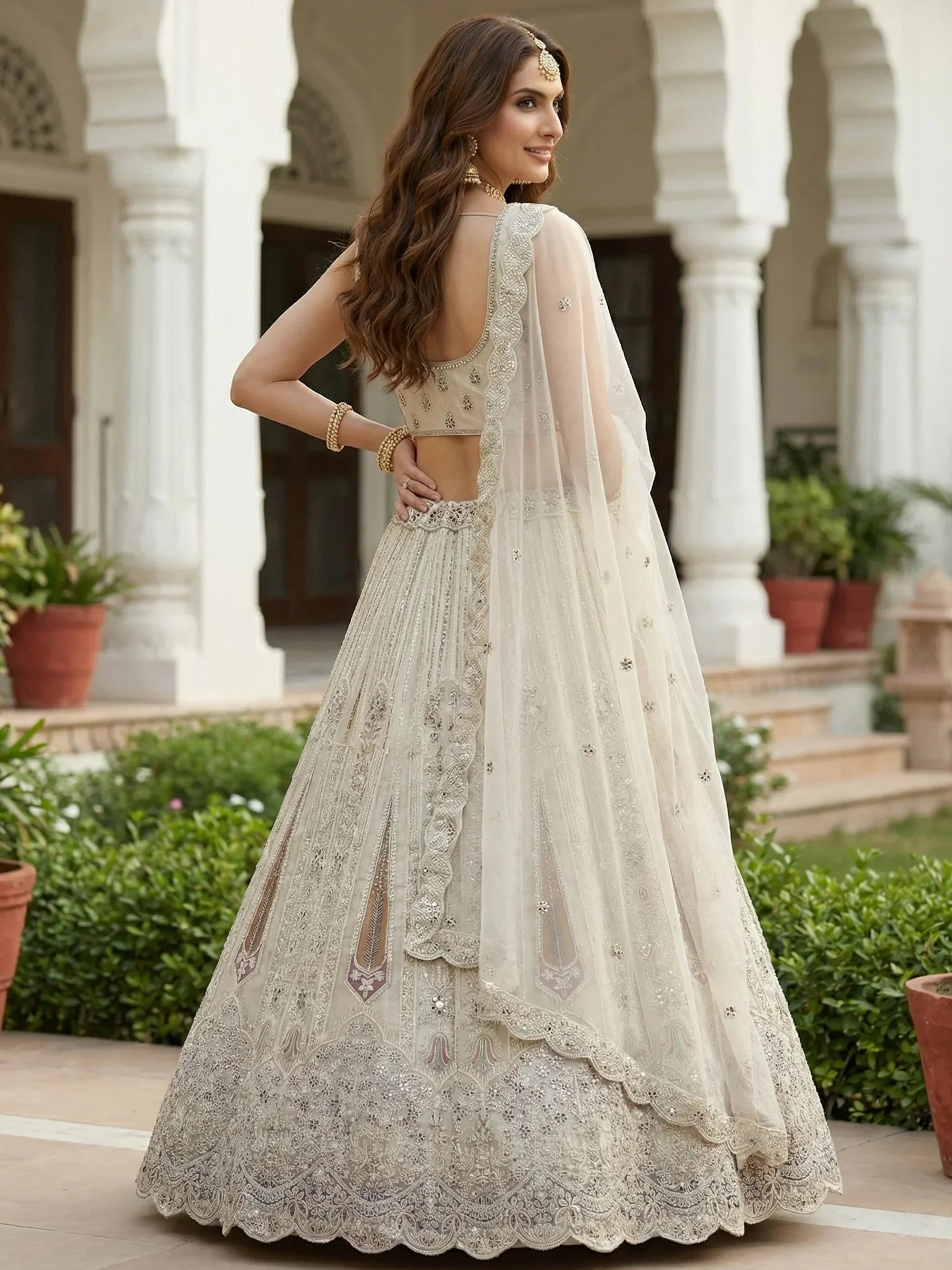 White Stylish Dori Embroidered Net Reception Wear Lehenga Choli