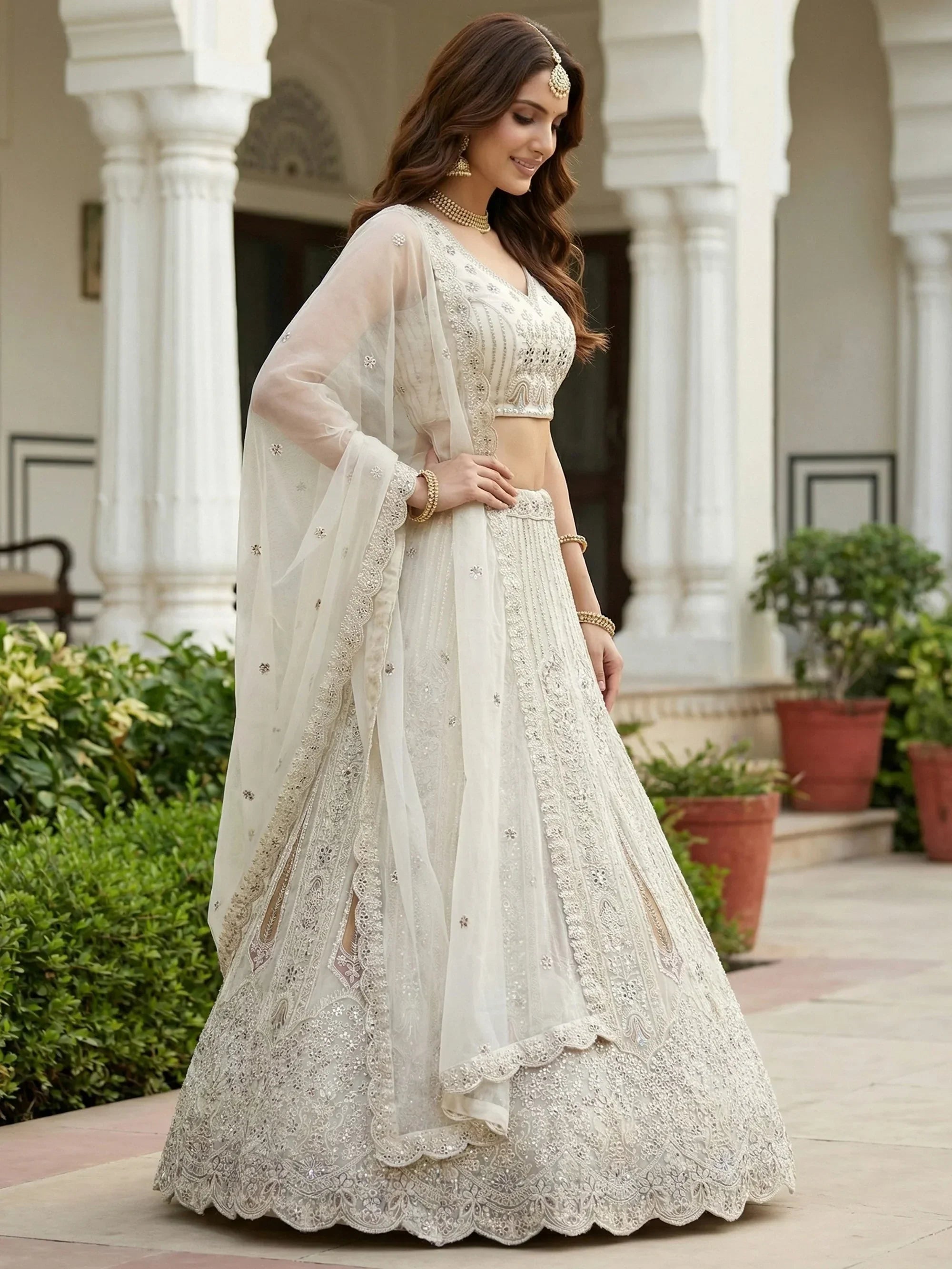 White Stylish Dori Embroidered Net Reception Wear Lehenga Choli