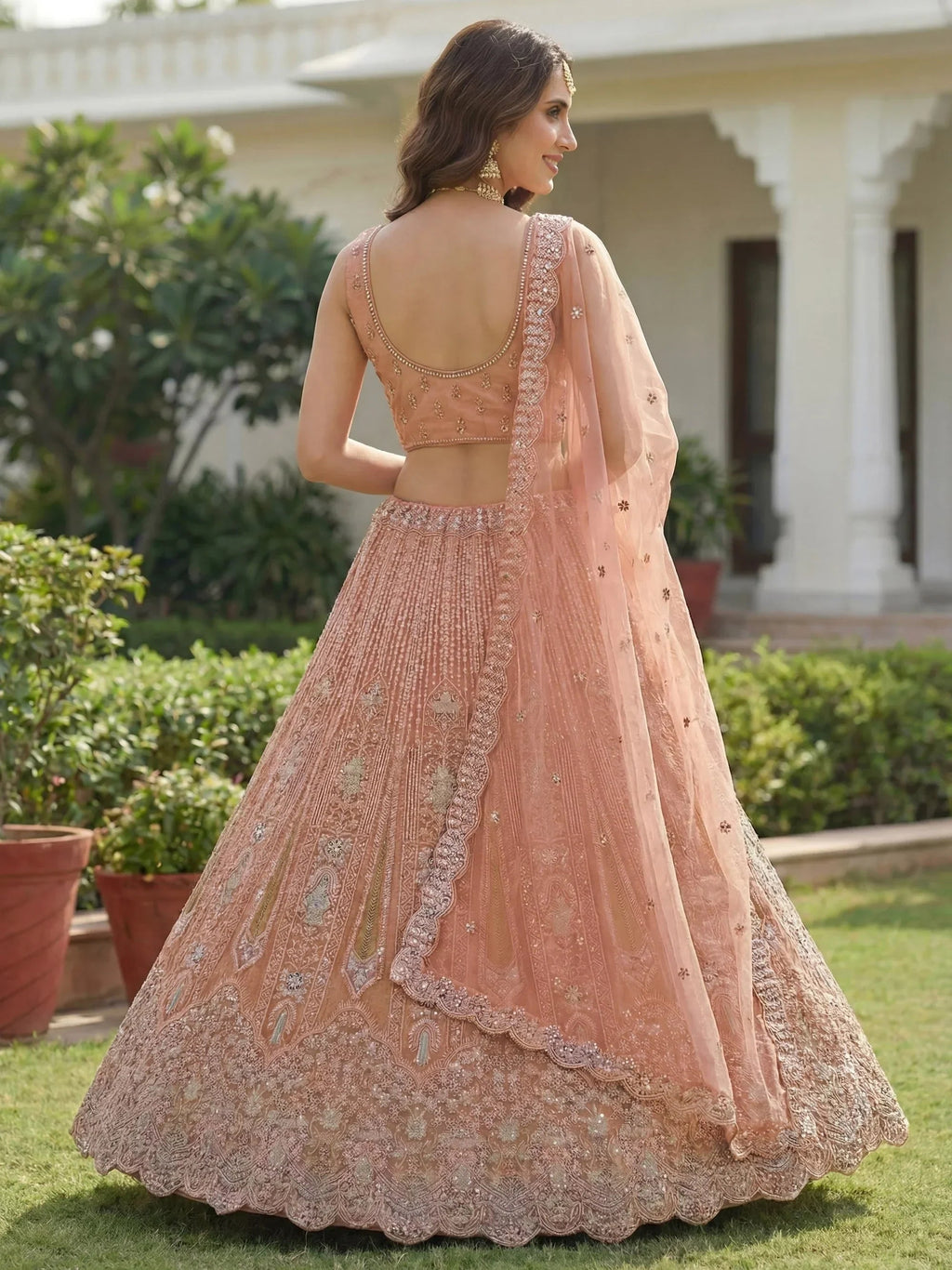 Peach Stylish Dori Embroidered Net Reception Wear Lehenga Choli