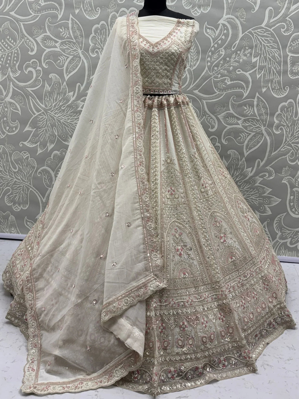 Off White Alluring Dori Embroidered Satin Bridal Lehenga Choli