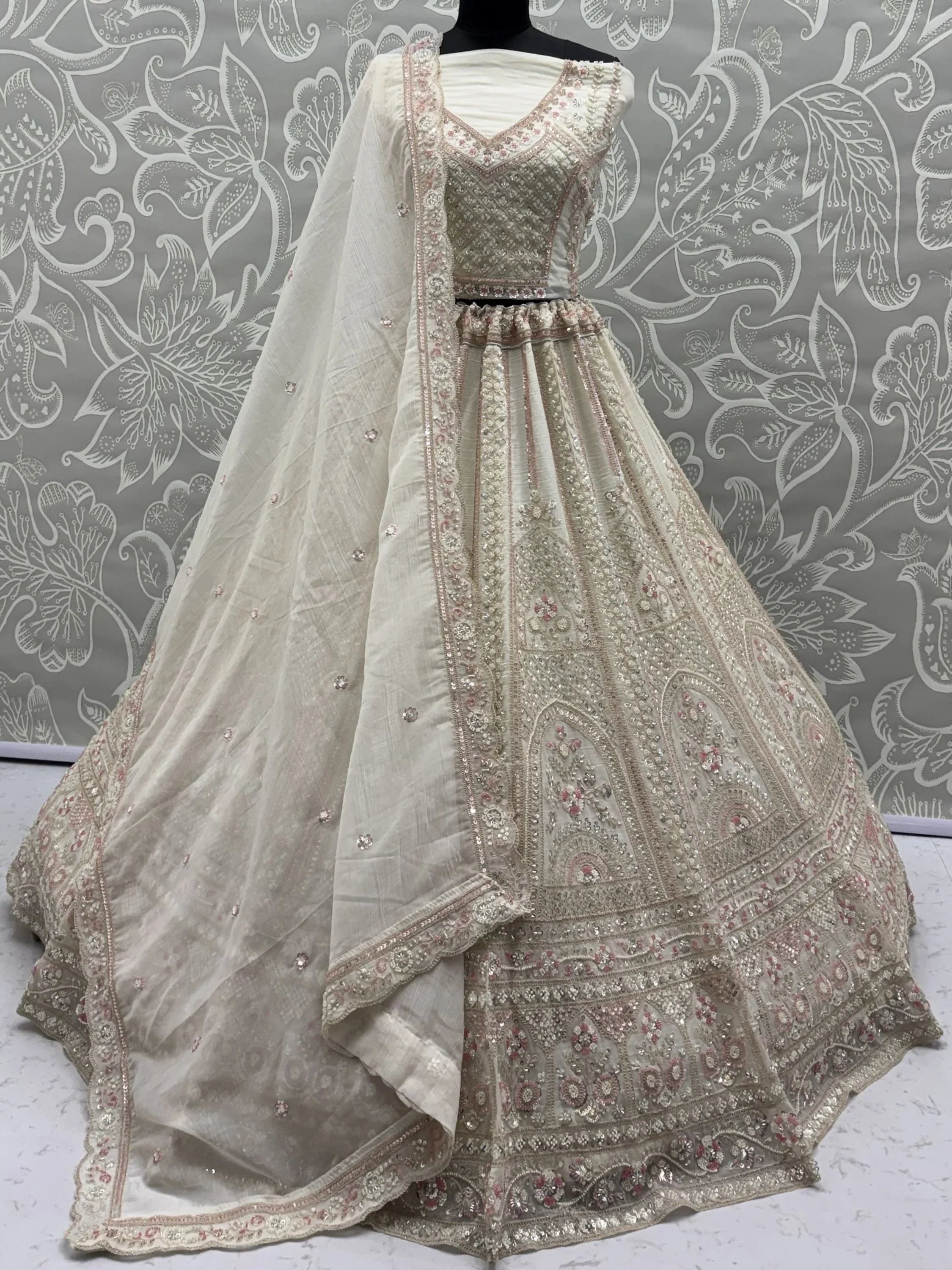 Off White Alluring Dori Embroidered Satin Bridal Lehenga Choli
