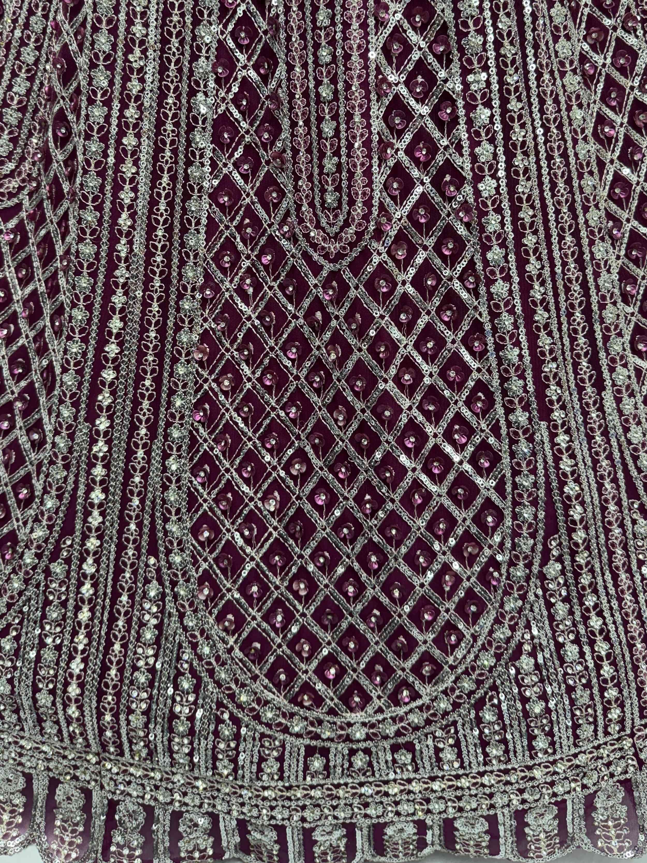 Wine Glamorous Sequins Embroidered Net Wedding Wear Lehenga Choli