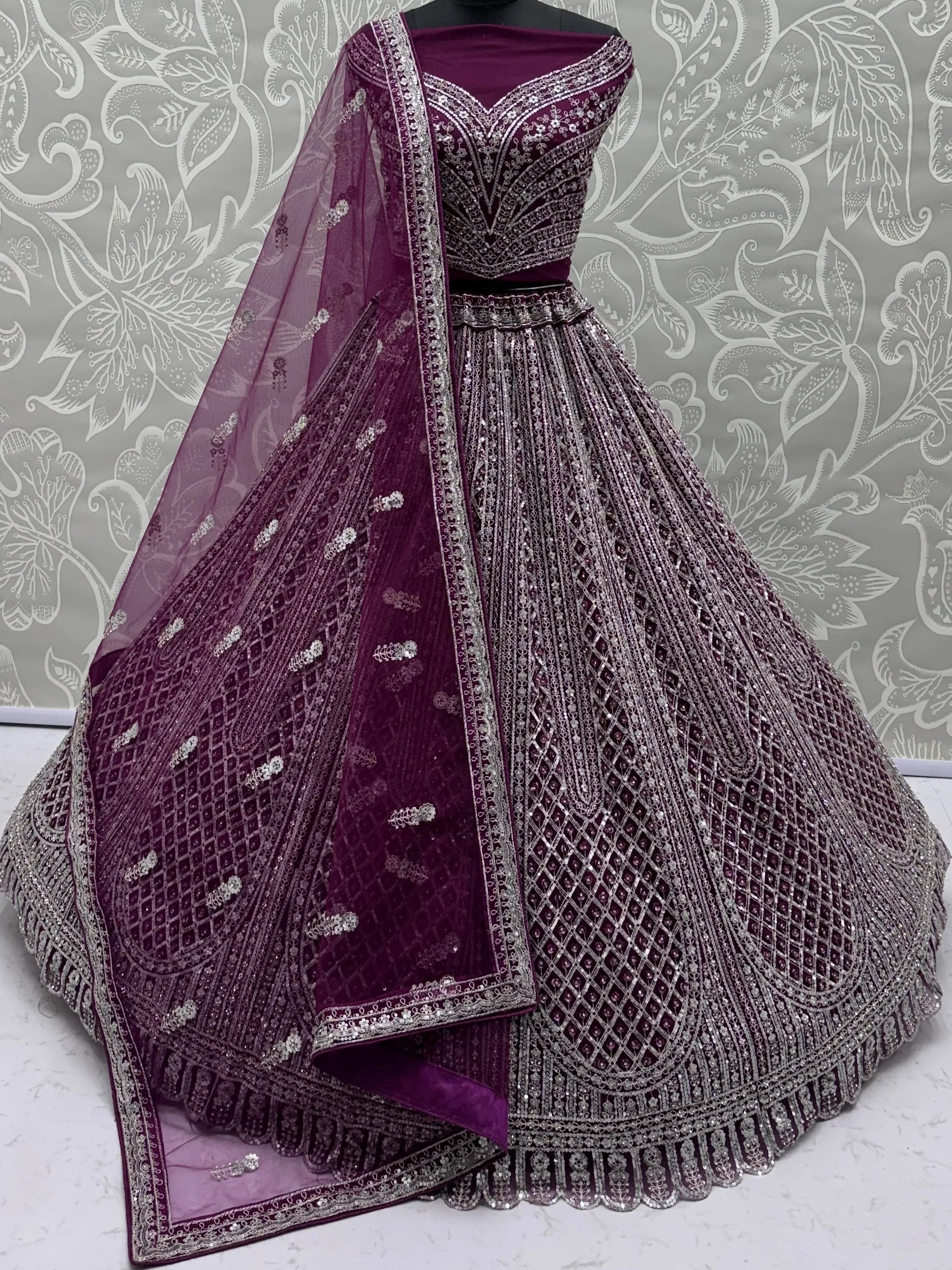 Wine Glamorous Sequins Embroidered Net Wedding Wear Lehenga Choli