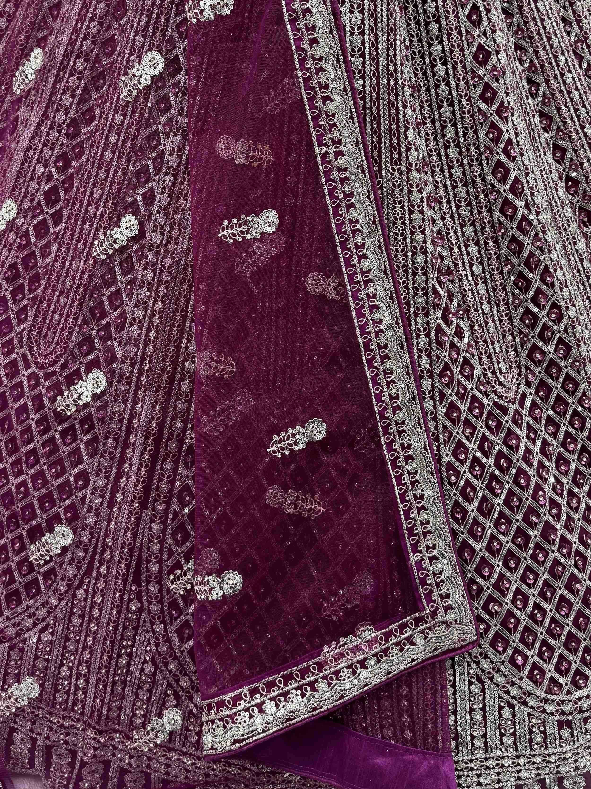 Wine Glamorous Sequins Embroidered Net Wedding Wear Lehenga Choli