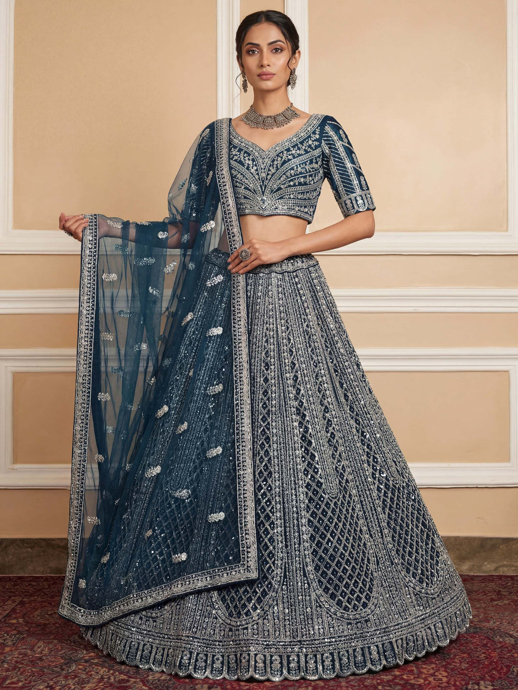 Blue Glamorous Sequins Embroidered Net Wedding Wear Lehenga Choli