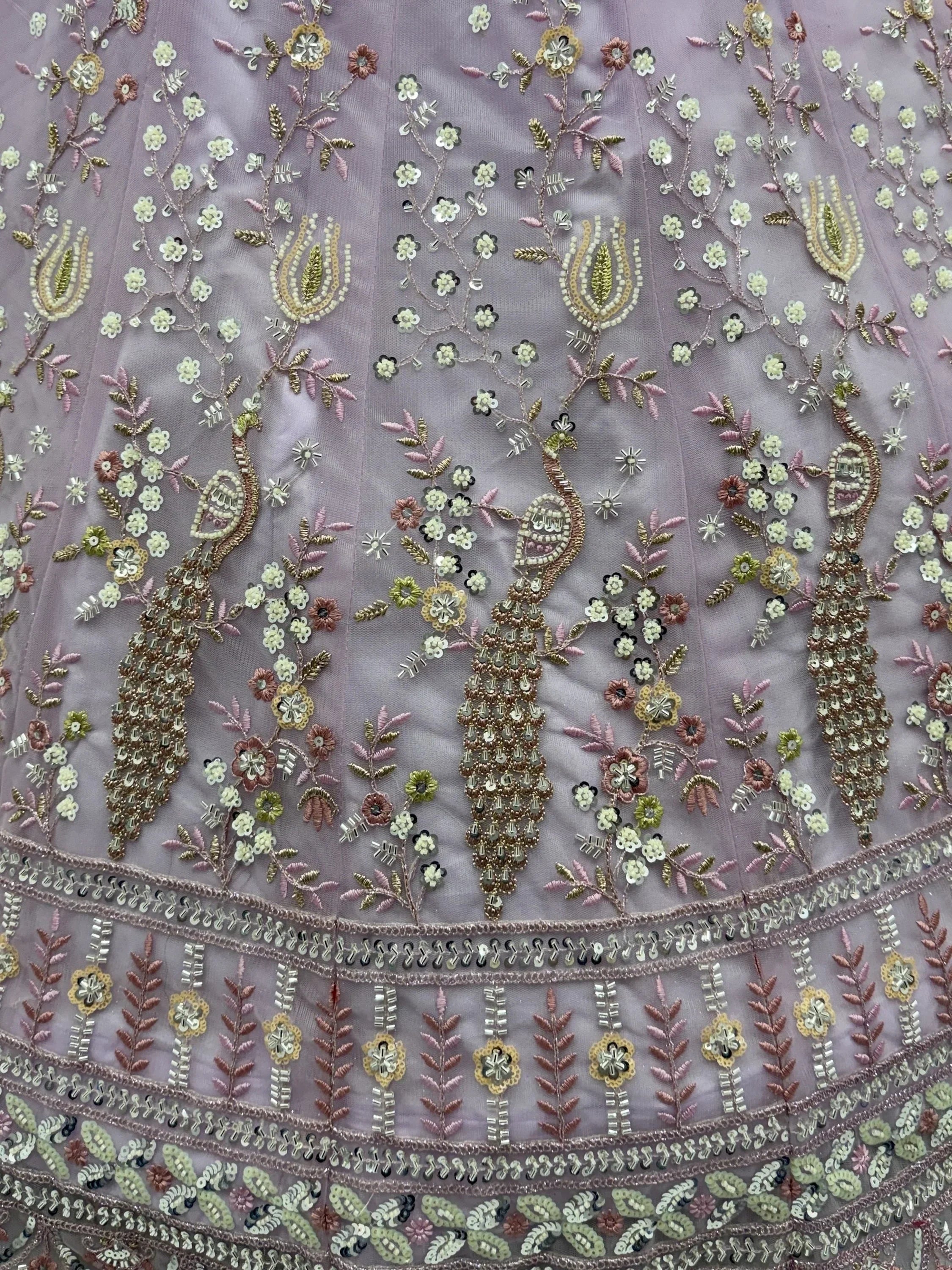 Lavender Gorgeous Embroidered Net Engagement Wear Lehenga Choli