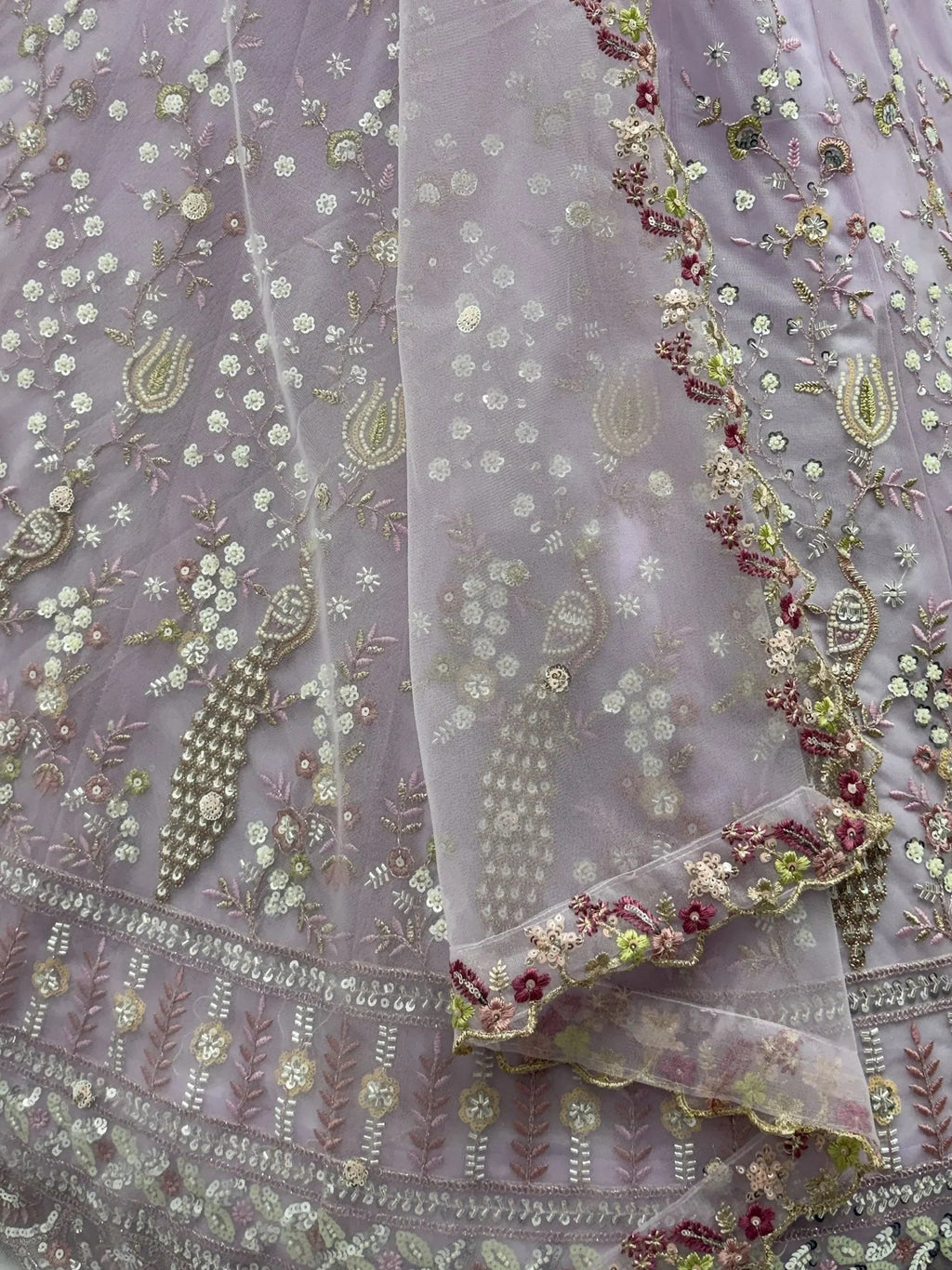 Lavender Gorgeous Embroidered Net Engagement Wear Lehenga Choli