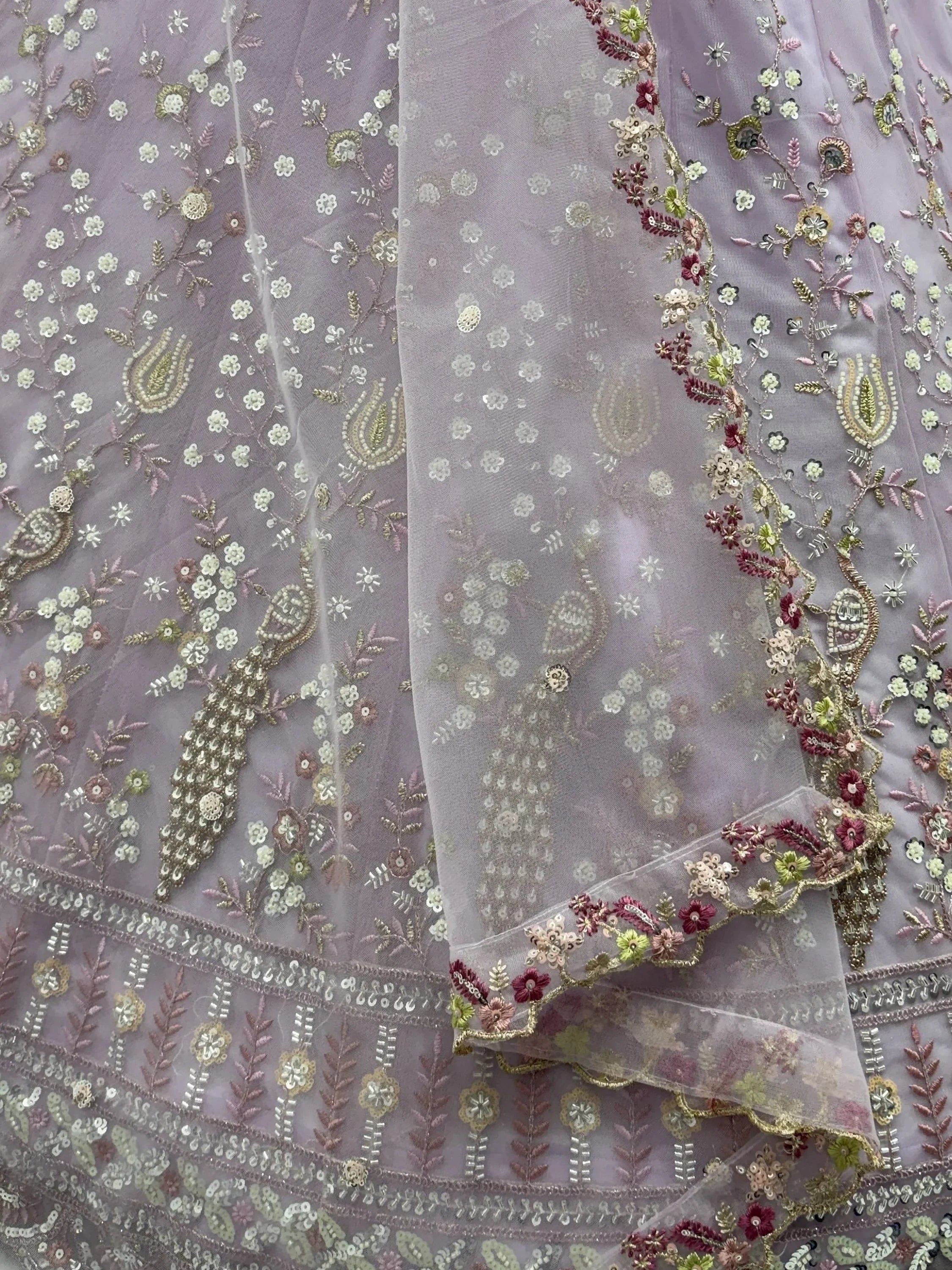 Lavender Gorgeous Embroidered Net Engagement Wear Lehenga Choli