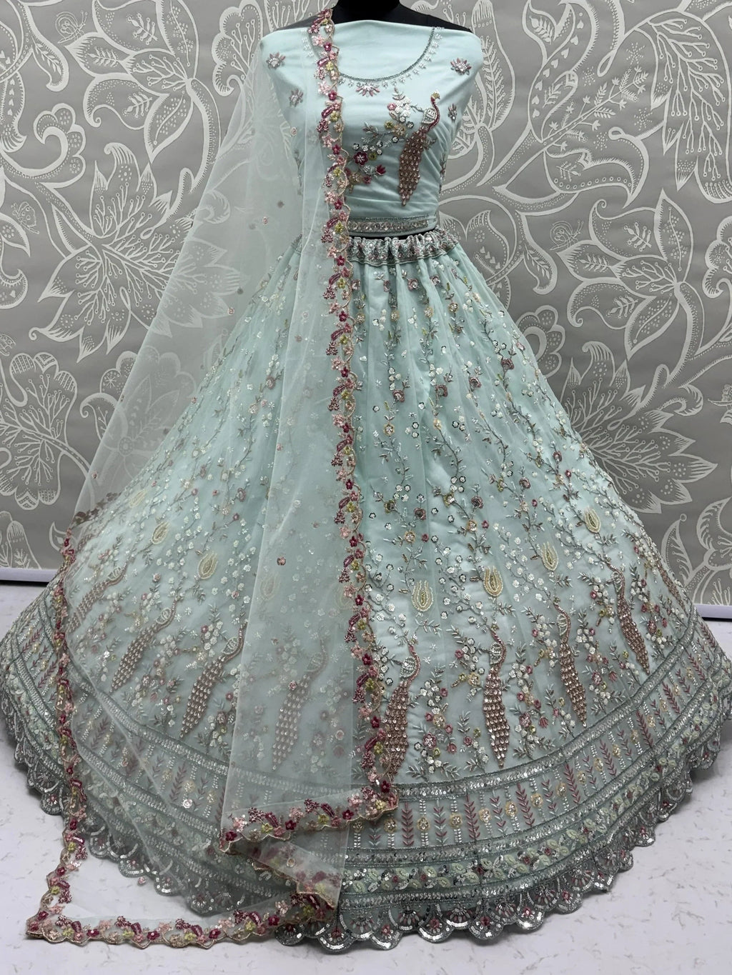 Sky Blue Gorgeous Embroidered Net Engagement Wear Lehenga Choli