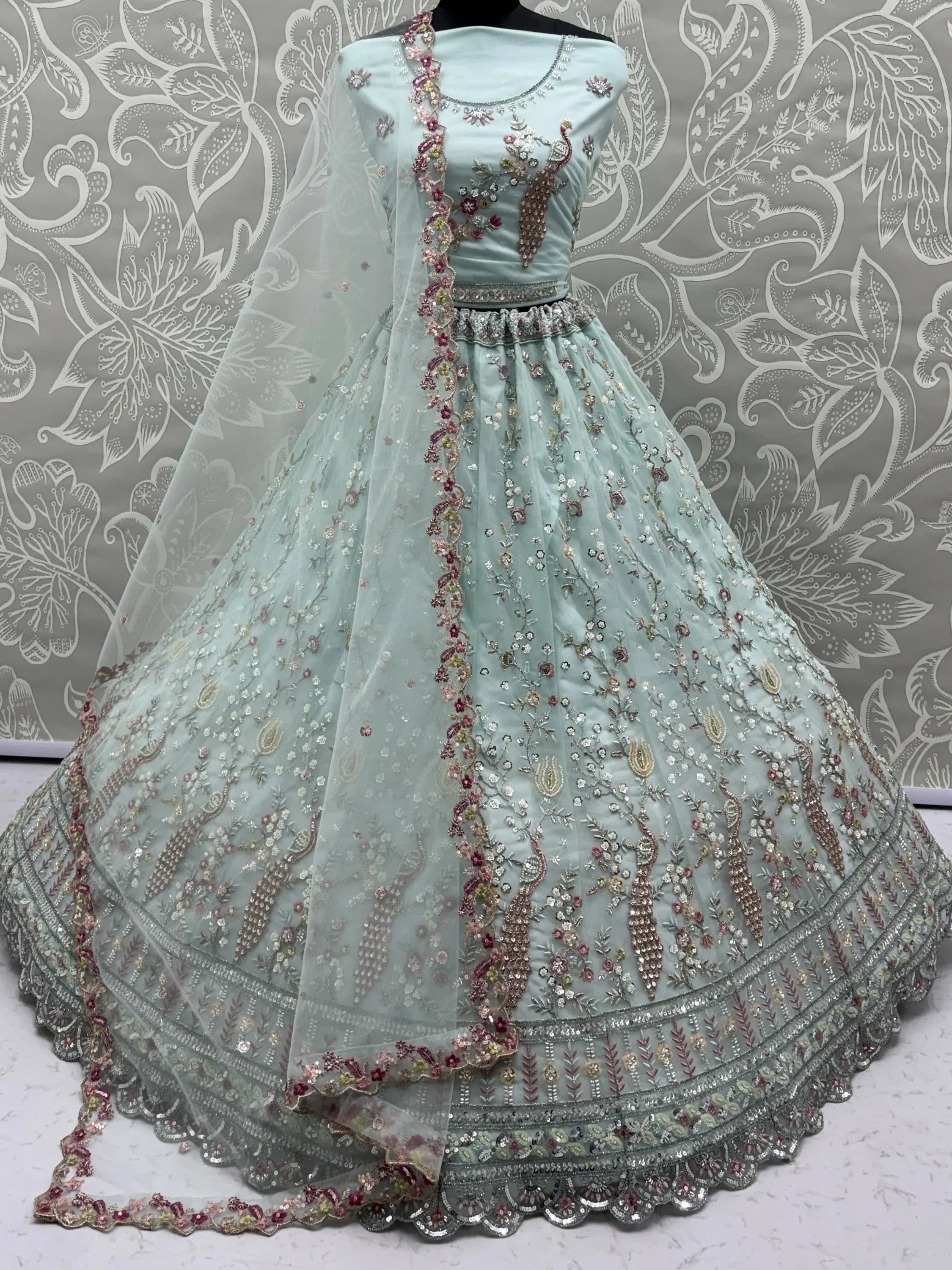 Sky Blue Gorgeous Embroidered Net Engagement Wear Lehenga Choli