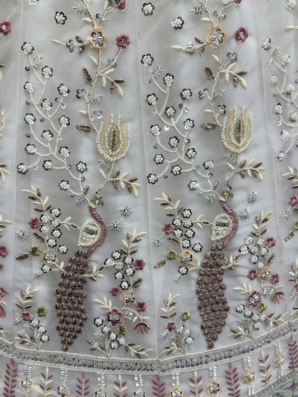 Off White Gorgeous Embroidered Net Engagement Wear Lehenga Choli